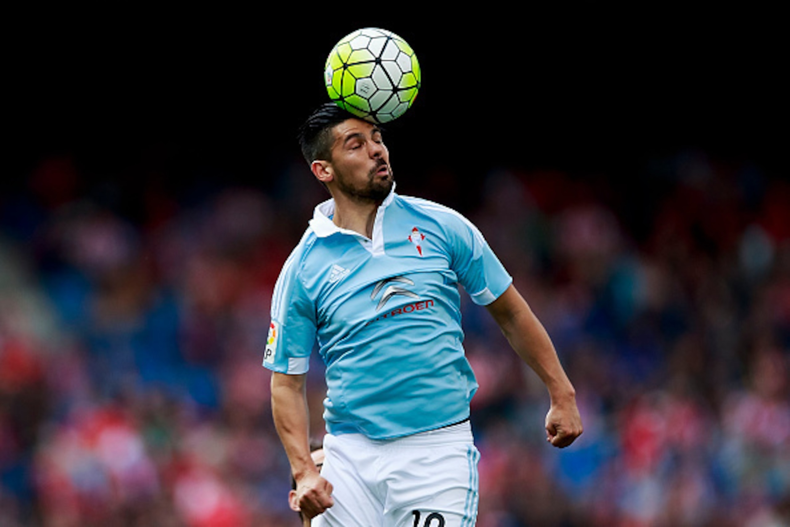 MADRID, SPAIN - MAY 14: Manuel Agudo Duran alias Nolito of RC Celta de Vigo saves on a header during the La Liga match between  Club Atletico de Madrid and Real Club Celta de Vigo at Vicente Calderon Stadium on May 14, 2016 in Madrid, Spain. (Photo by Gon