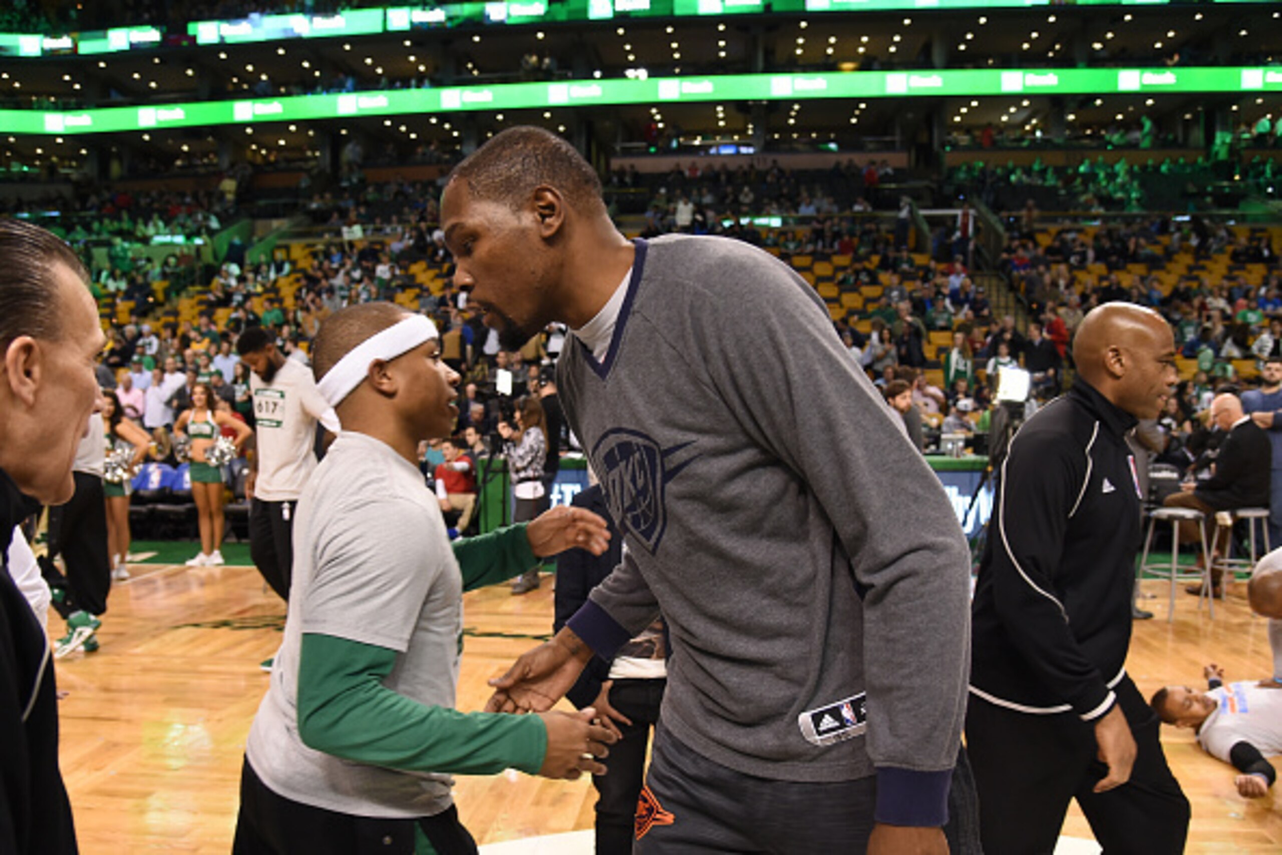 BOSTON, MA - MARCH  16: Isaiah Thomas #4 of the Boston Celtics and Kevin Durant #35 of the Oklahoma City Thunder are seen before the game on March 16, 2016 at the TD Garden in Boston, Massachusetts.  NOTE TO USER: User expressly acknowledges and agrees th