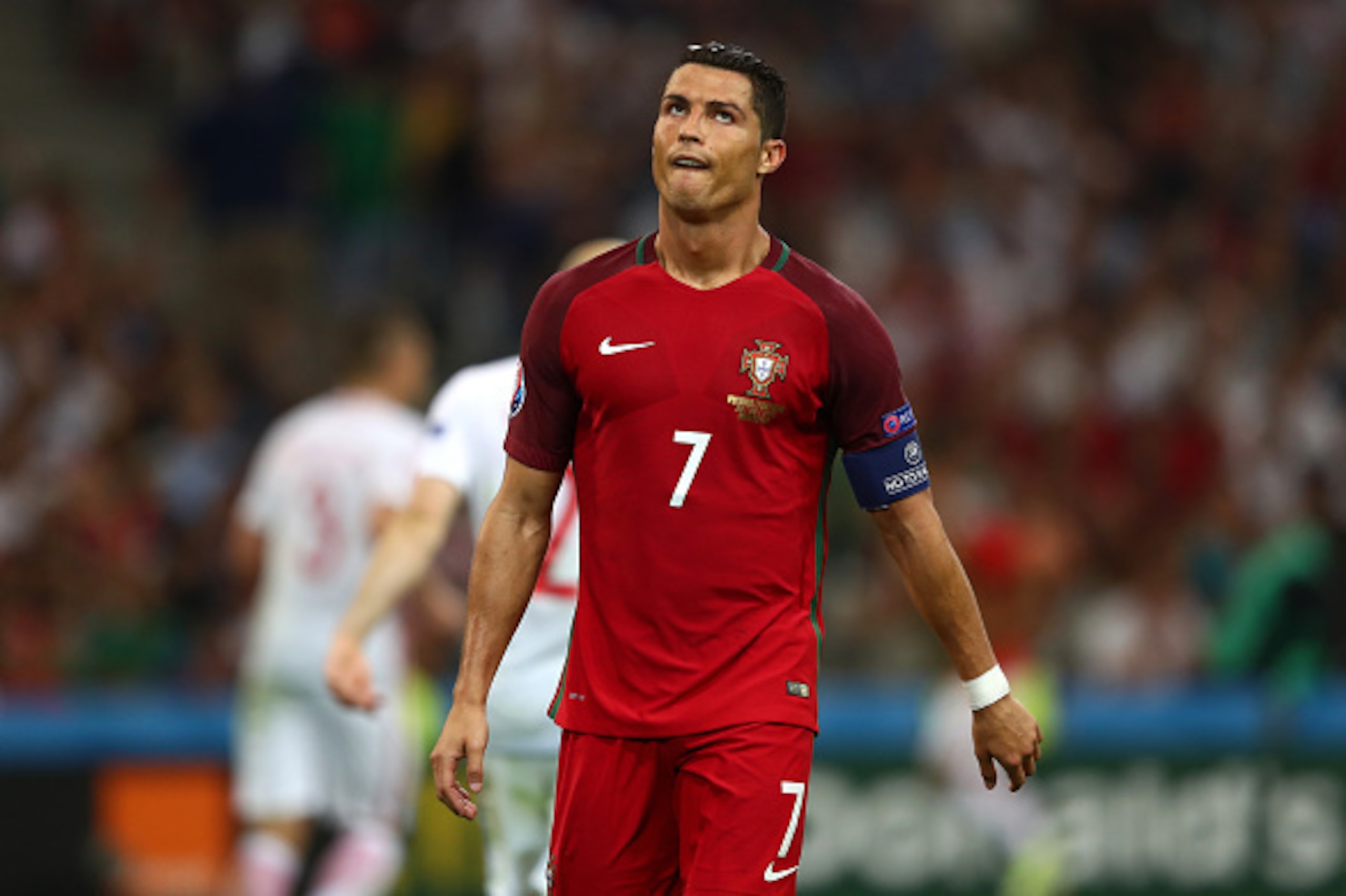 MARSEILLE, FRANCE - JUNE 30: Cristiano Ronaldo of Portugal reacts during the UEFA EURO 2016 quarter final match between Poland and Portugal at Stade Velodrome on June 30, 2016 in Marseille, France.  (Photo by Lars Baron/Getty Images)