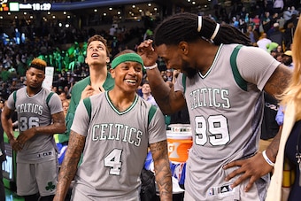 BOSTON, MA - APRIL 13:  Isaiah Thomas #4 and Jae Crowder #99 of the Boston Celtics celebrate after the game against the Miami Heat on April 13, 2016 at the TD Garden in Boston, Massachusetts.  NOTE TO USER: User expressly acknowledges and agrees that, by 