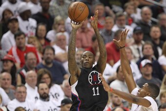 Apr 25, 2016; Portland, OR, USA; Los Angeles Clippers guard Jamal Crawford (11) shoots over Portland Trail Blazers forward Maurice Harkless (4) in game four of the first round of the NBA Playoffs at Moda Center at the Rose Quarter. Mandatory Credit: Jaime