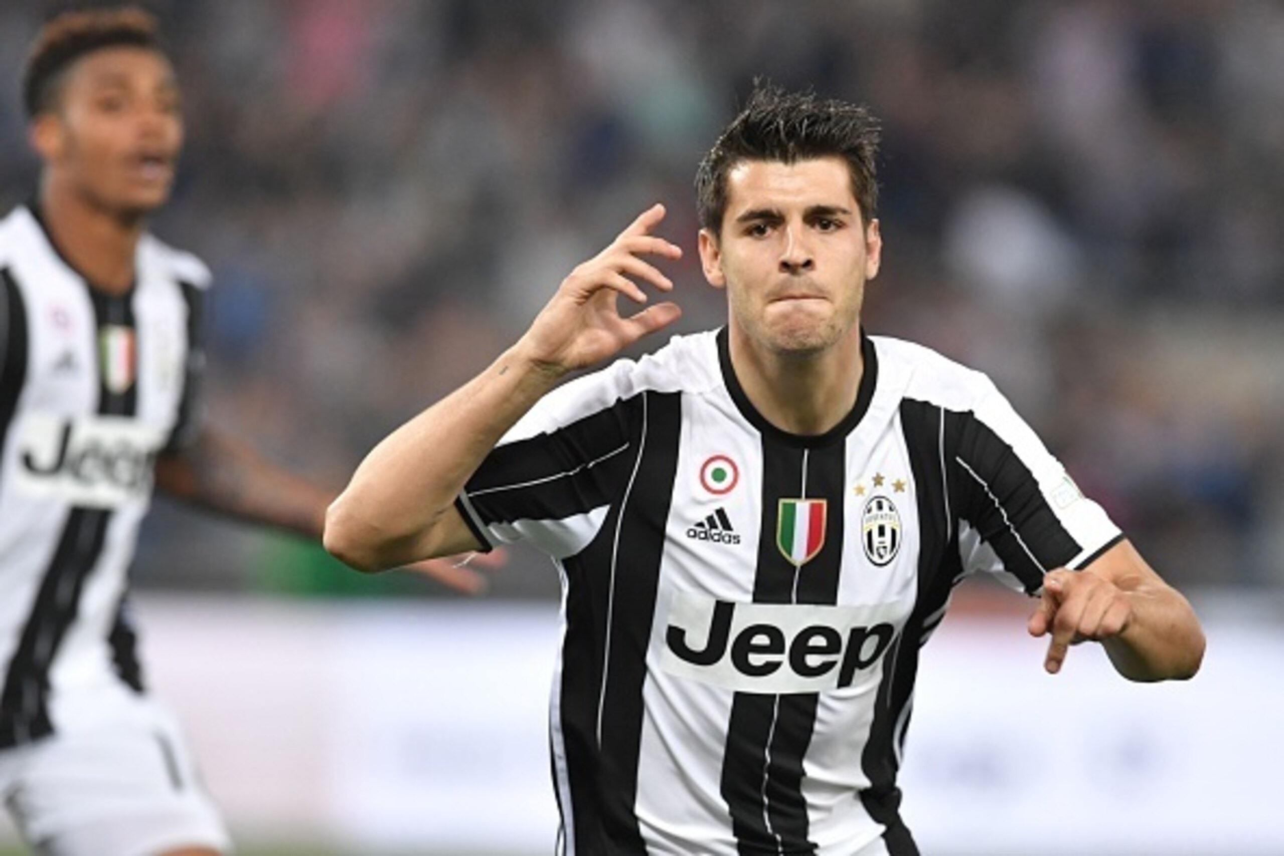 Juventus' forward from Spain Alvaro Morata celebrates after scoring during the Italian Tim Cup final football match AC Milan vs Juventus on May 21, 2016 at the Olympic Stadium in Rome. AFP PHOTO / TIZIANA FABI / AFP / TIZIANA FABI (Photo credit Juventus' forward from Spain Alvaro Morata celebrates after scoring during the Italian Tim Cup final football match AC Milan vs Juventus on May 21, 2016 at the Olympic Stadium in Rome. AFP PHOTO / TIZIANA FABI / AFP / TIZIANA FABI (Photo credit
