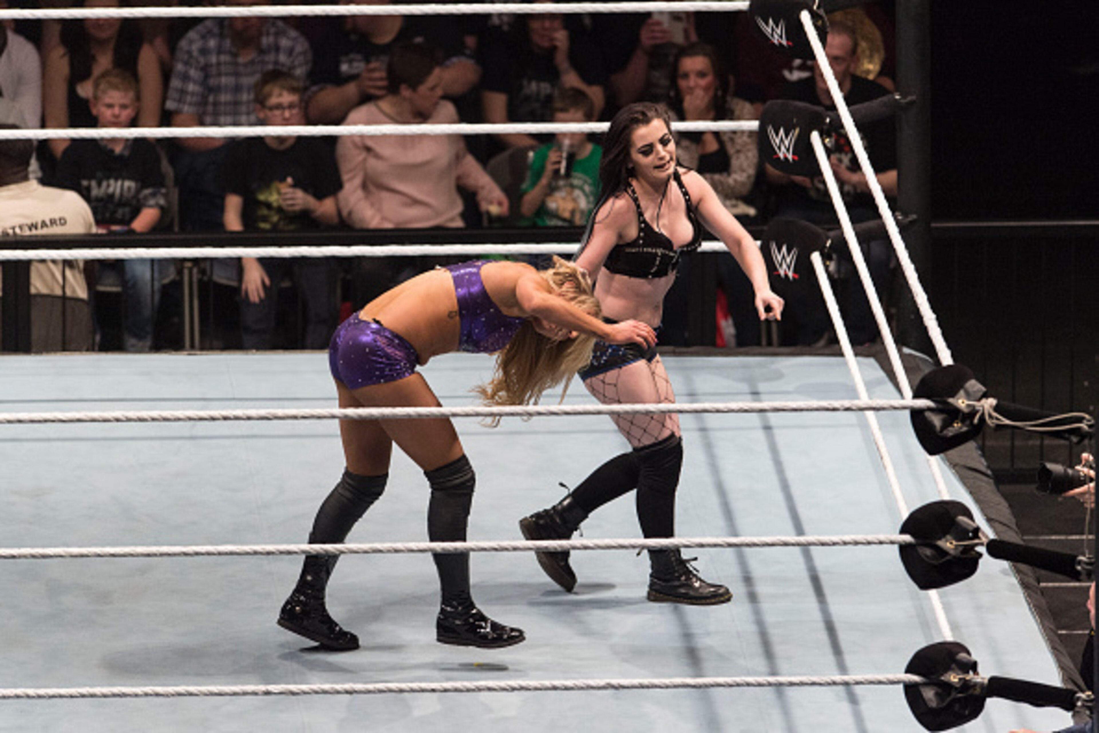 COLOGNE, GERMANY - FEBRUARY 11: Paige competes in the ring against Charlotte at the Road to WrestleMania at the Lanxess Arena on February 11, 2016 in Cologne, Germany. (Photo by Marc Pfitzenreuter/Getty Images) COLOGNE, GERMANY - FEBRUARY 11: Paige competes in the ring against Charlotte at the Road to WrestleMania at the Lanxess Arena on February 11, 2016 in Cologne, Germany. (Photo by Marc Pfitzenreuter/Getty Images)