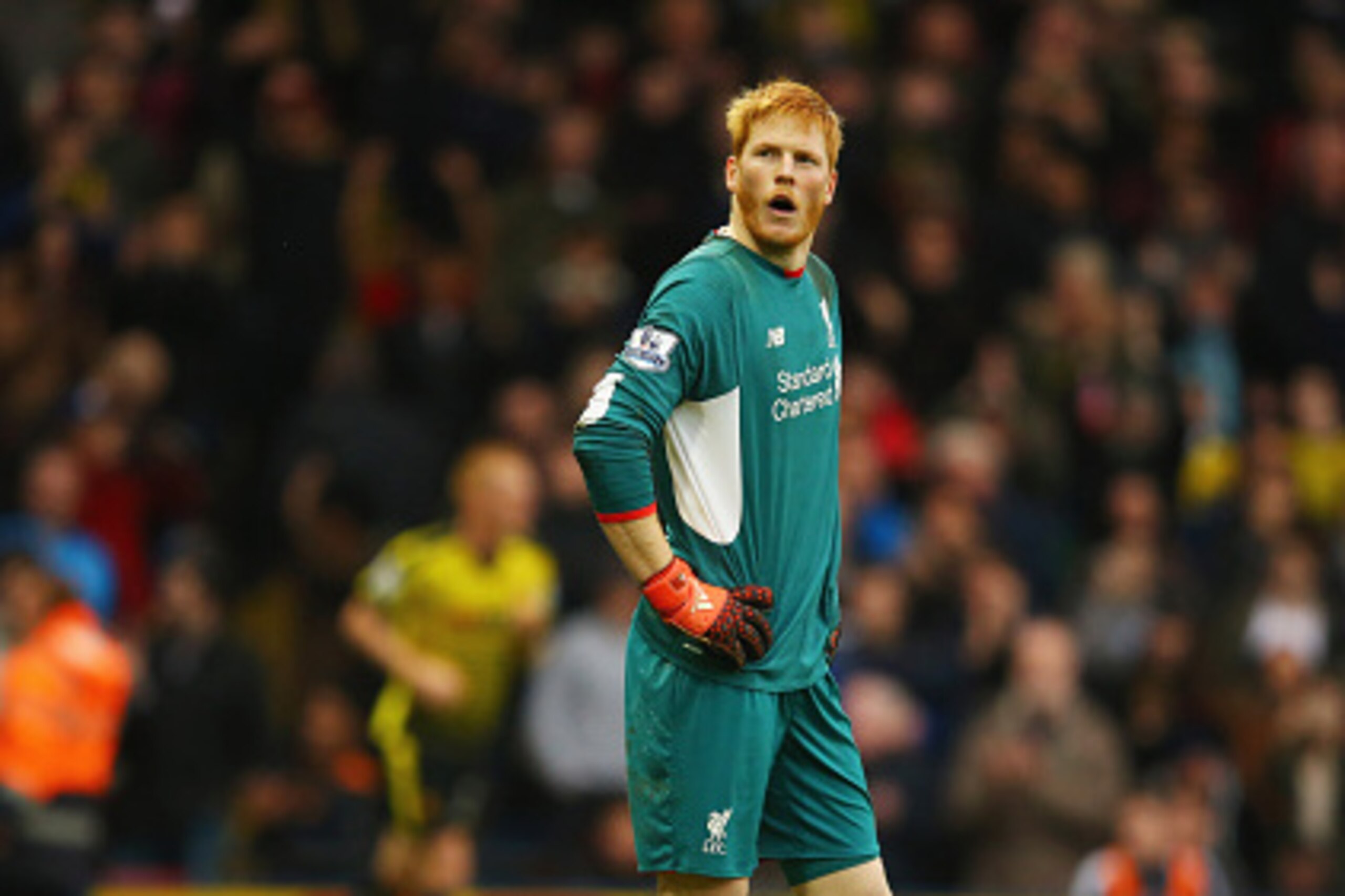WATFORD, ENGLAND - DECEMBER 20:  Adam Bogdan of Liverpool looks dejected as Odion Ighalo of Watford scores their third goal during the Barclays Premier League match between Watford and Liverpool at Vicarage Road on December 20, 2015 in Watford, England.  