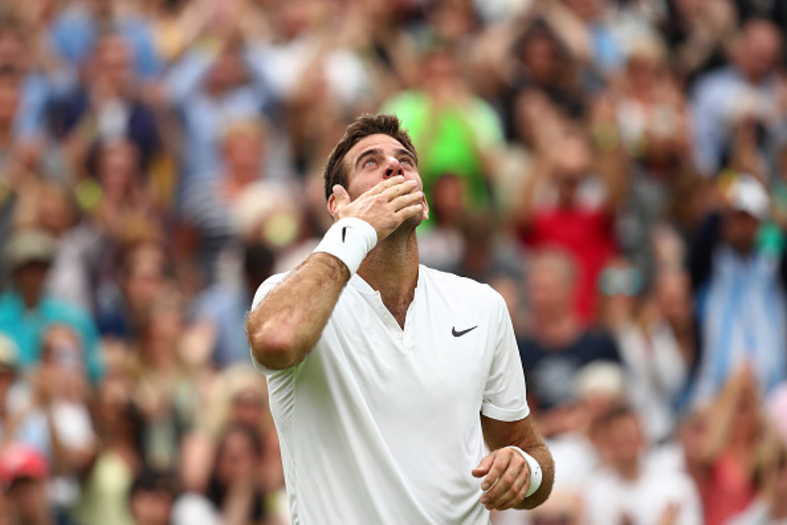 LONDON, ENGLAND - JULY 01:  Juan Martin Del Potro of Argentina celebrates victory during the Men's Singles second round match against Stan Wawrinka of Switzerland on day five of the Wimbledon Lawn Tennis Championships at the All England Lawn Tennis and Cr