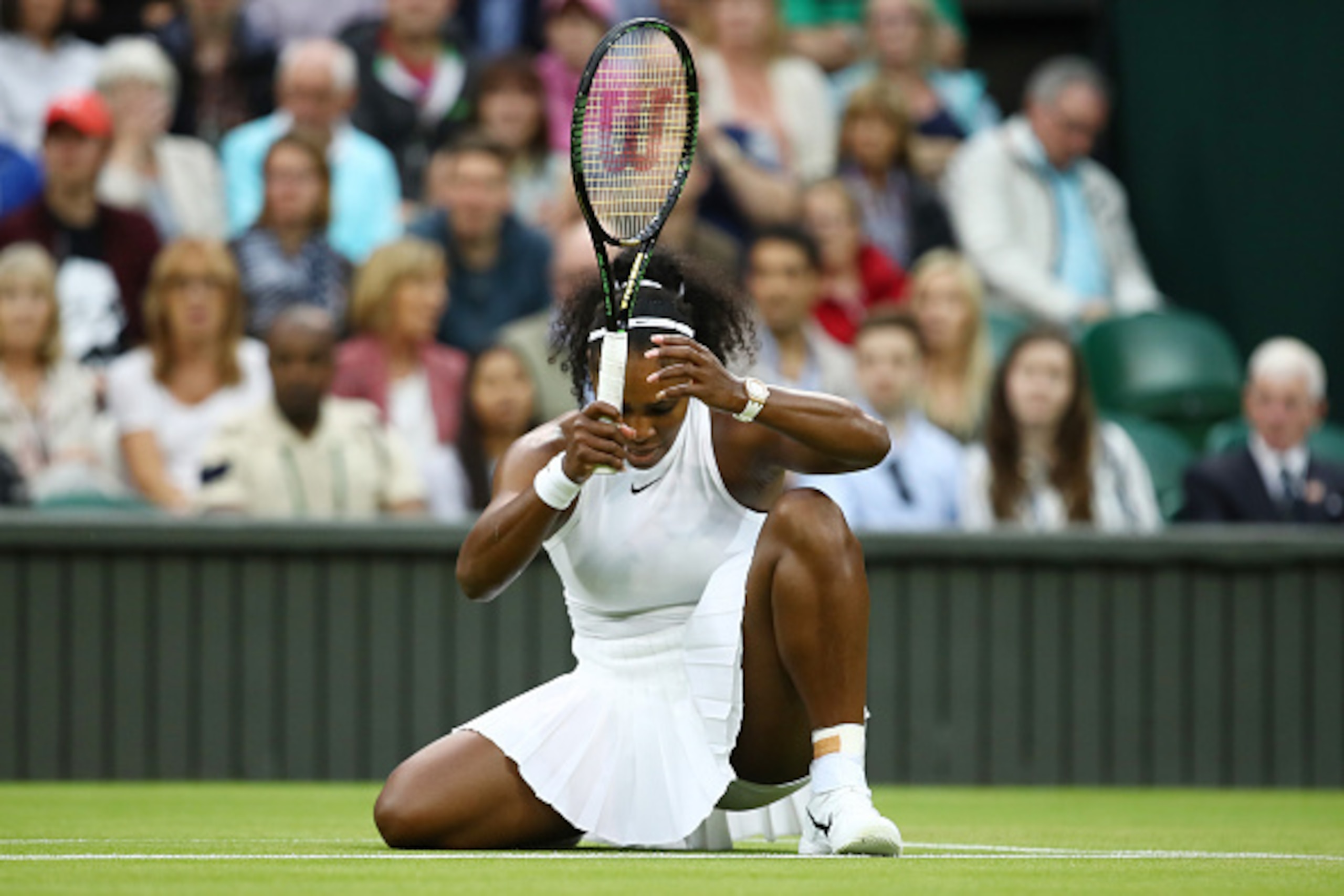 LONDON, ENGLAND - JULY 01:  Serena Williams of The United States reacts during the Ladies Singles second round match against  Christina McHale of the United States on day five of the Wimbledon Lawn Tennis Championships at the All England Lawn Tennis and C