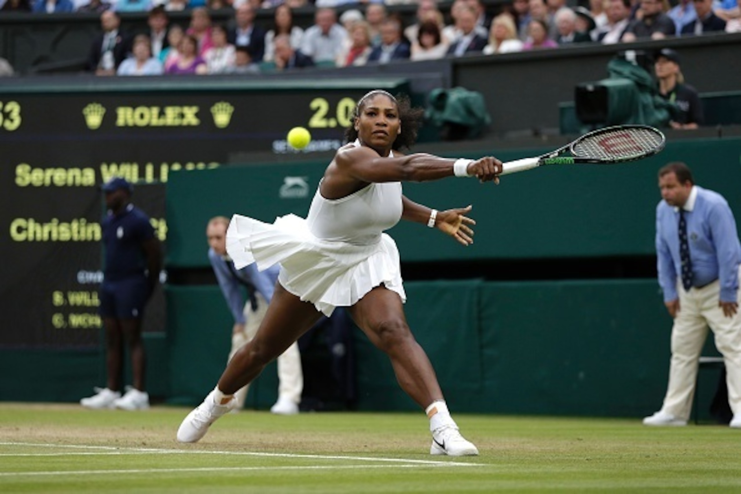 US player Serena Williams returns to US player Christina McHale during their women's singles second round match on the fifth day of the 2016 Wimbledon Championships at The All England Lawn Tennis Club in Wimbledon, southwest London, on July 1, 2016. / AFP