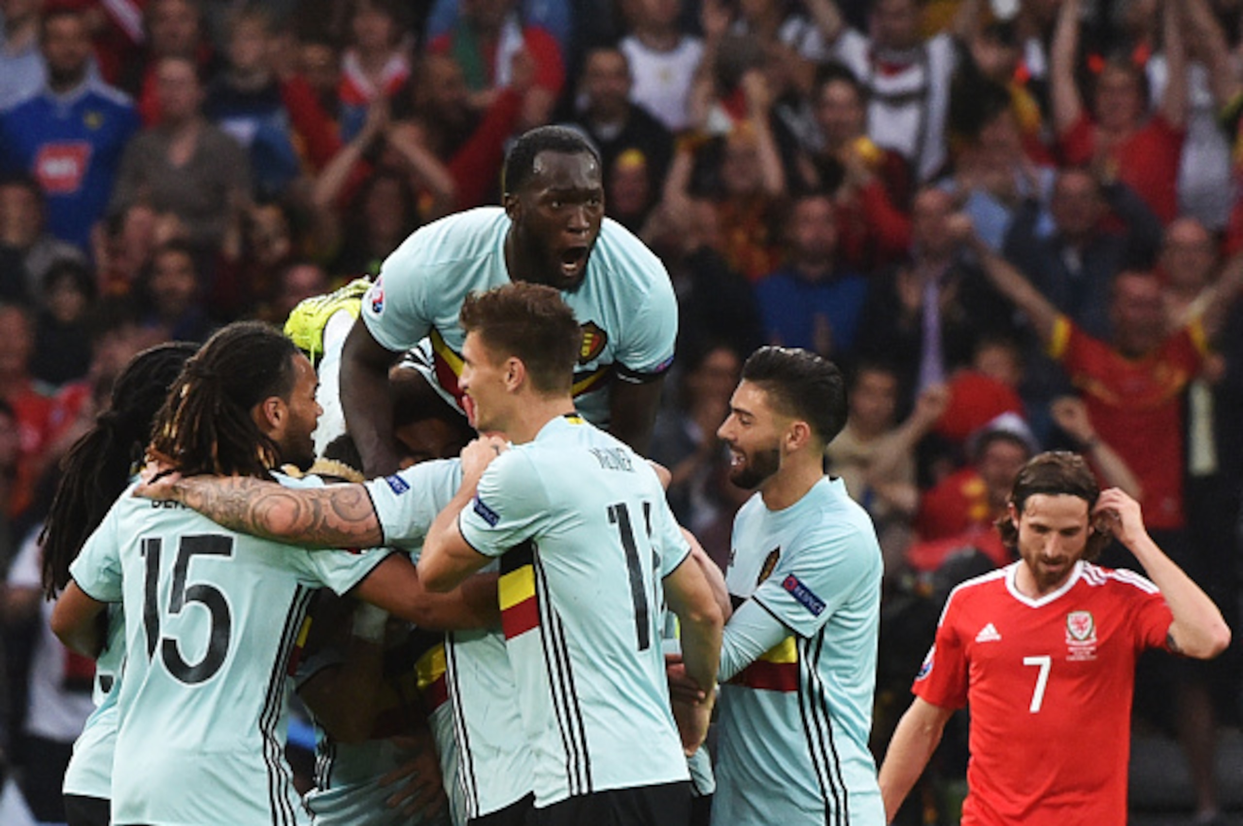 Belgium's players celebrate after scoring a goal during the Euro 2016 quarter-final football match between Wales and Belgium at the Pierre-Mauroy stadium in Villeneuve-d'Ascq near Lille, on July 1, 2016. / AFP / PHILIPPE HUGUEN (Photo credit should Belgium's players celebrate after scoring a goal during the Euro 2016 quarter-final football match between Wales and Belgium at the Pierre-Mauroy stadium in Villeneuve-d'Ascq near Lille, on July 1, 2016. / AFP / PHILIPPE HUGUEN (Photo credit should