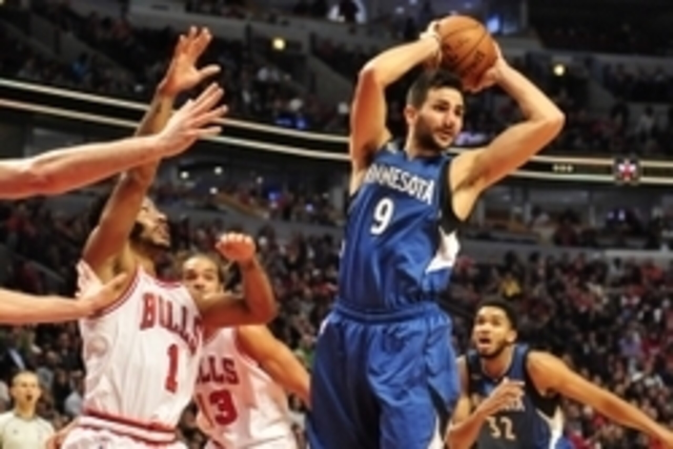Nov 7, 2015; Chicago, IL, USA; Minnesota Timberwolves guard Ricky Rubio (9) looks to pass around Chicago Bulls guard Derrick Rose (1) during the second half at the United Center. Minnesota defeated Chicago 102-93 in overtime. Mandatory Credit: David Banks