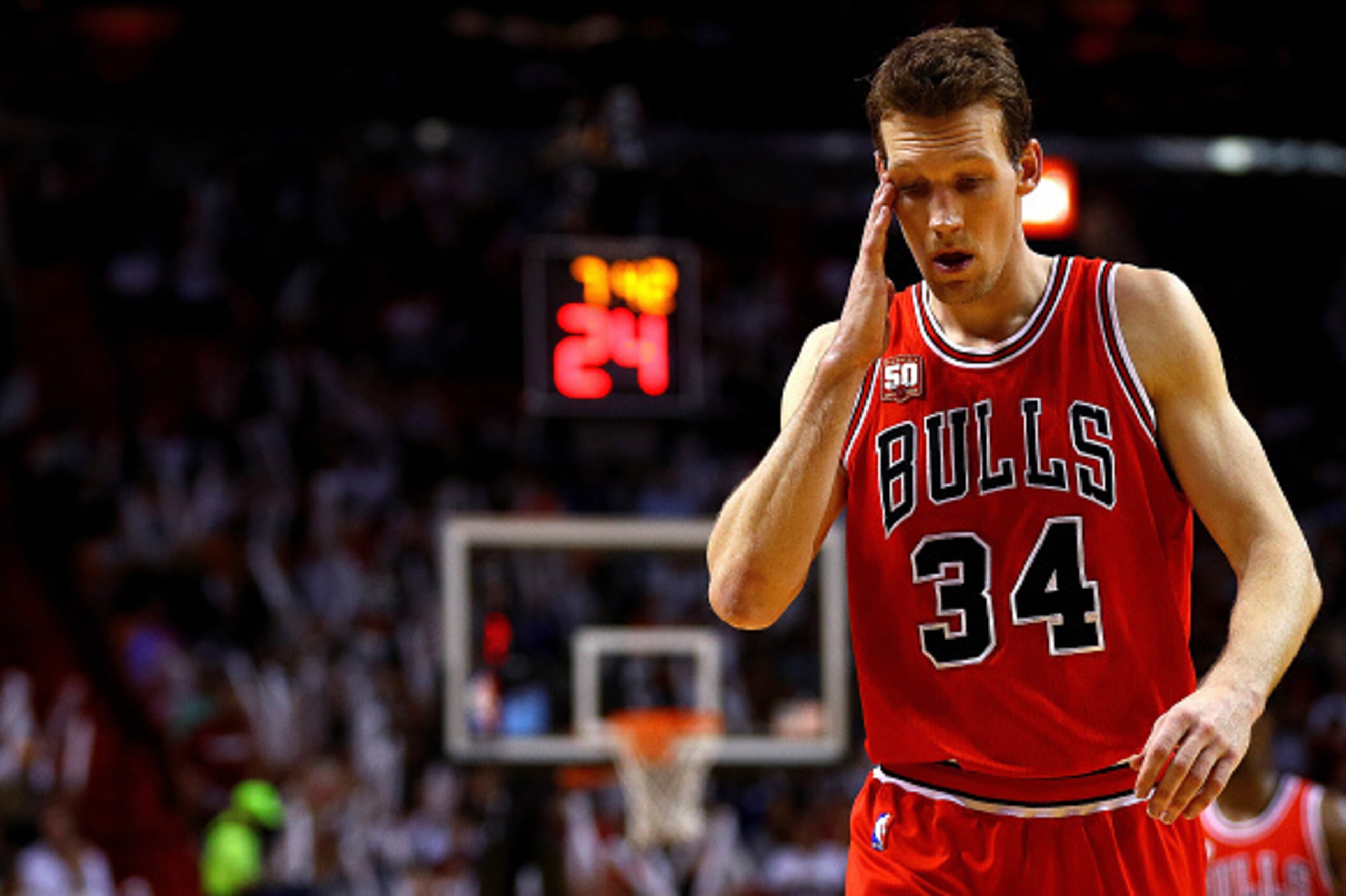 MIAMI, FLORIDA - APRIL 07:  Mike Dunleavy #34 of the Chicago Bulls looks on during a game against the Miami Heat  at American Airlines Arena on April 7, 2016 in Miami, Florida.  NOTE TO USER: User expressly acknowledges and agrees that, by downloading and