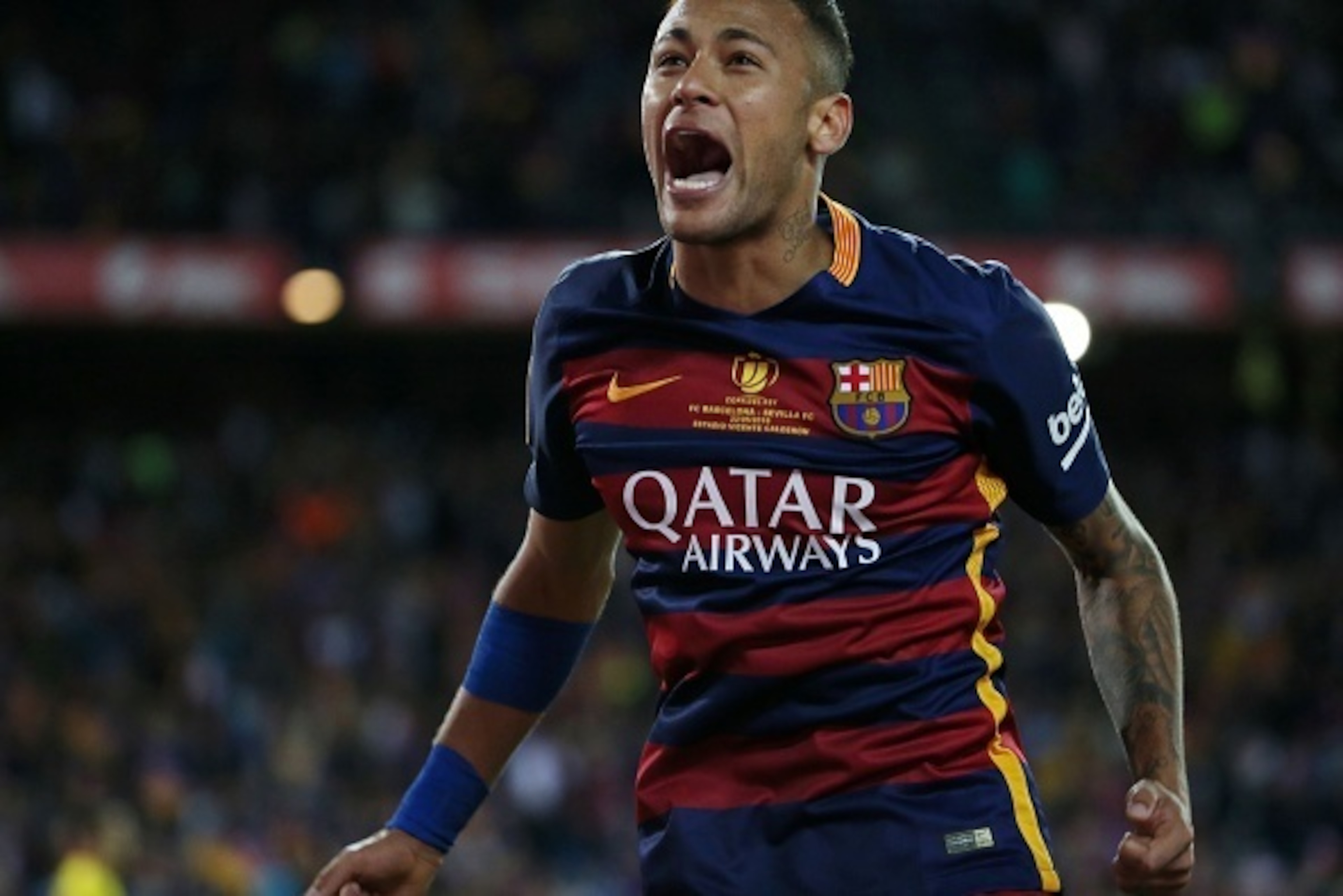 Barcelona's Brazilian forward Neymar celebrates at the end of the Spanish 'Copa del Rey' (King's Cup) final match FC Barcelona vs Sevilla FC at the Vicente Calderon stadium in Madrid on May 22, 2016. / AFP / CESAR MANSO        (Photo credit should read CE