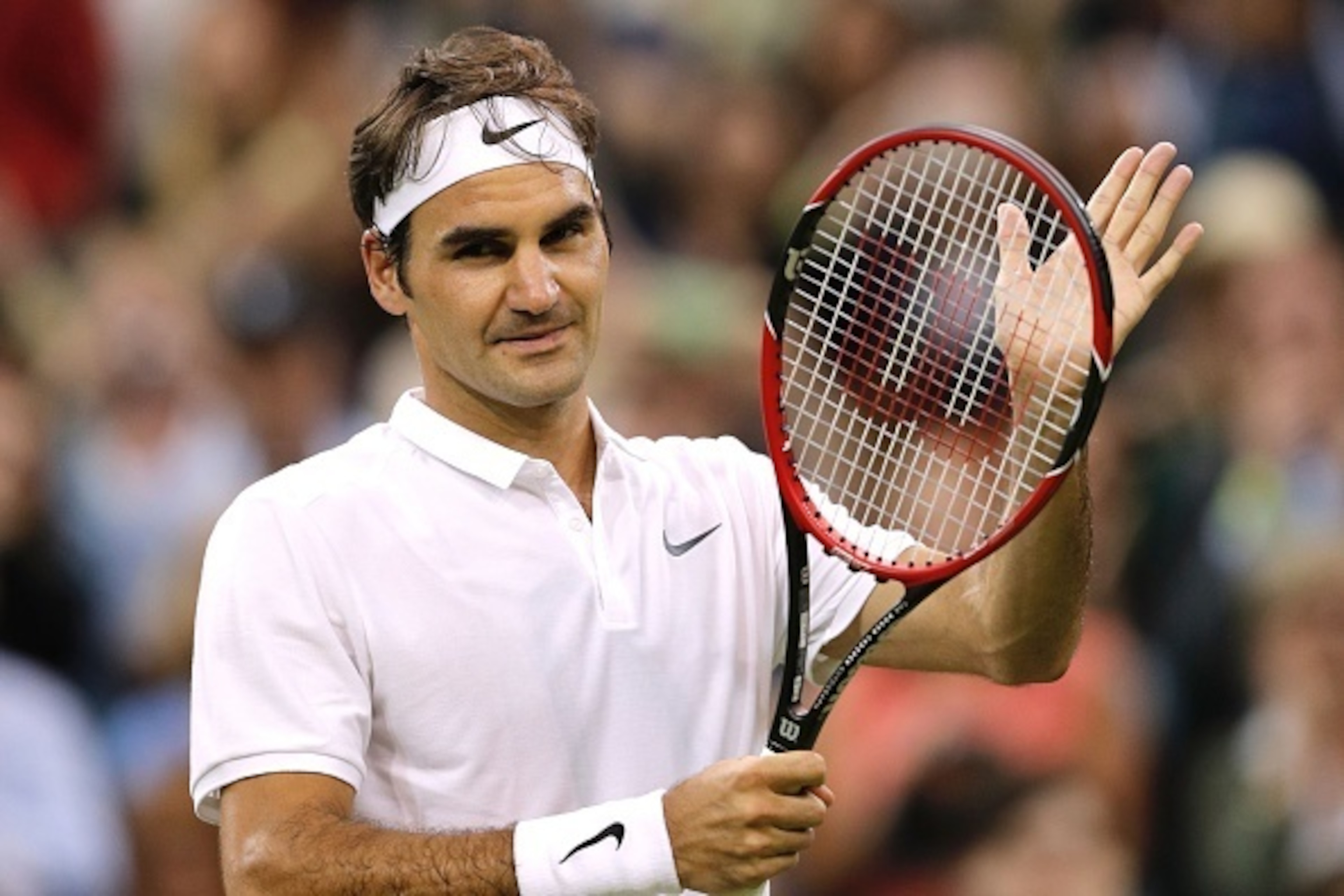 Switzerland's Roger Federer celebrates beating Britain's Daniel Evans during their men's singles third round match on the fifth day of the 2016 Wimbledon Championships at The All England Lawn Tennis Club in Wimbledon, southwest London, on July 1, 2016. / 