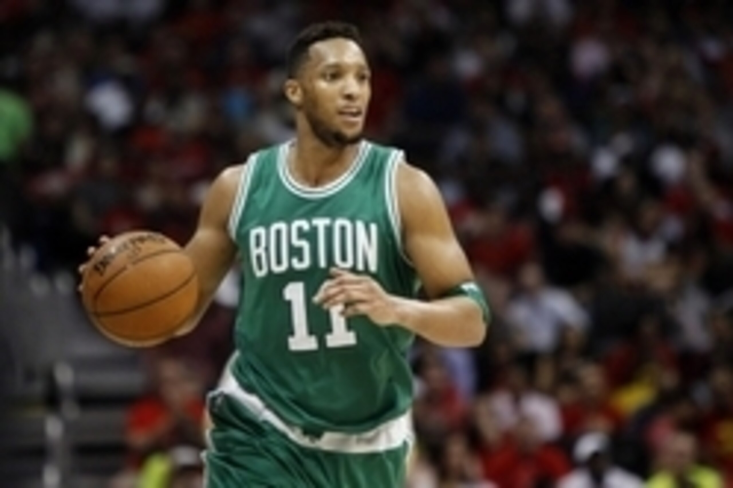 Apr 26, 2016; Atlanta, GA, USA; Boston Celtics guard Evan Turner (11) dribbles against the Atlanta Hawks in the third quarter in game five of the first round of the NBA Playoffs at Philips Arena. Mandatory Credit: Brett Davis-USA TODAY Sports