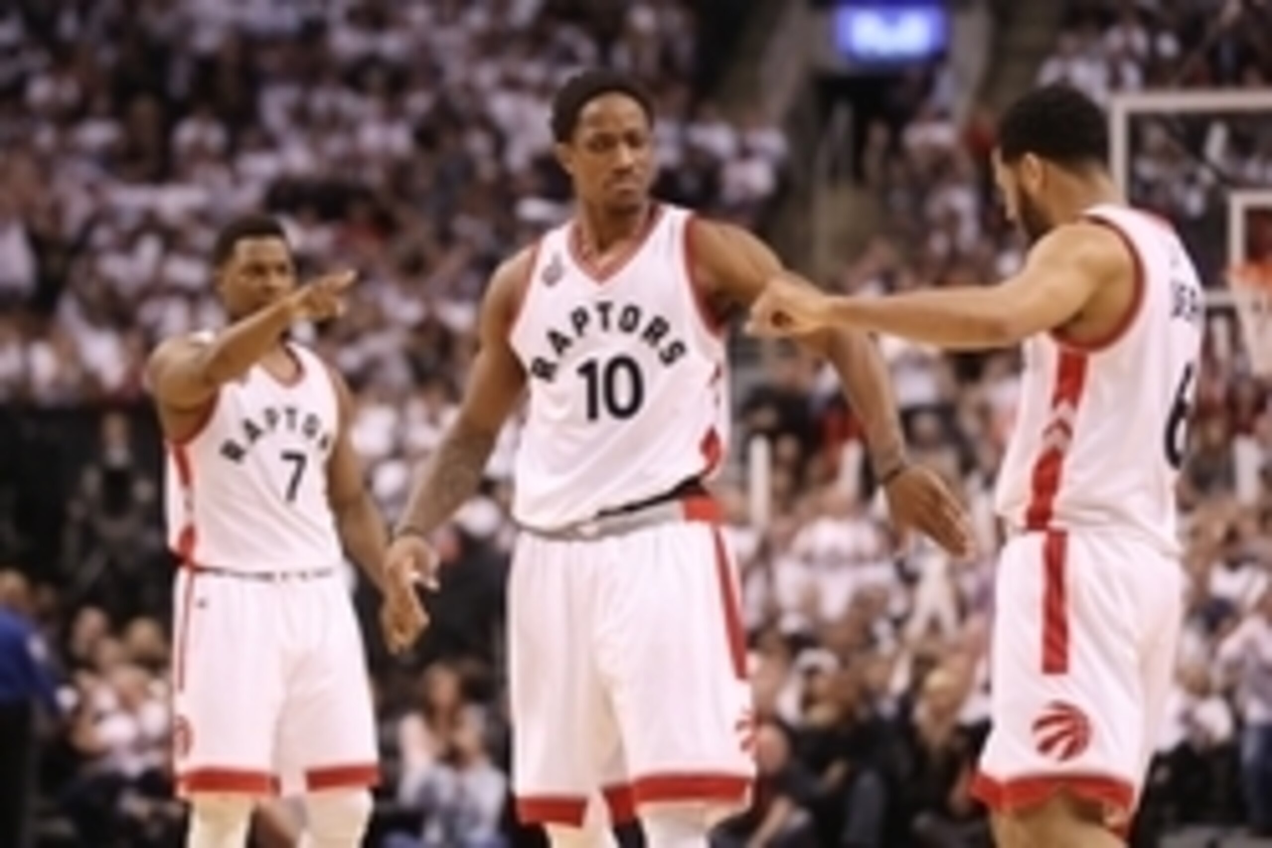 May 11, 2016; Toronto, Ontario, CAN; Toronto Raptors guard DeMar DeRozan (10) celebrates his basket with point guard Cory Joseph (6) and point guard Kyle Lowry (7) against the Miami Heat in game five of the second round of the NBA Playoffs at Air Canada C