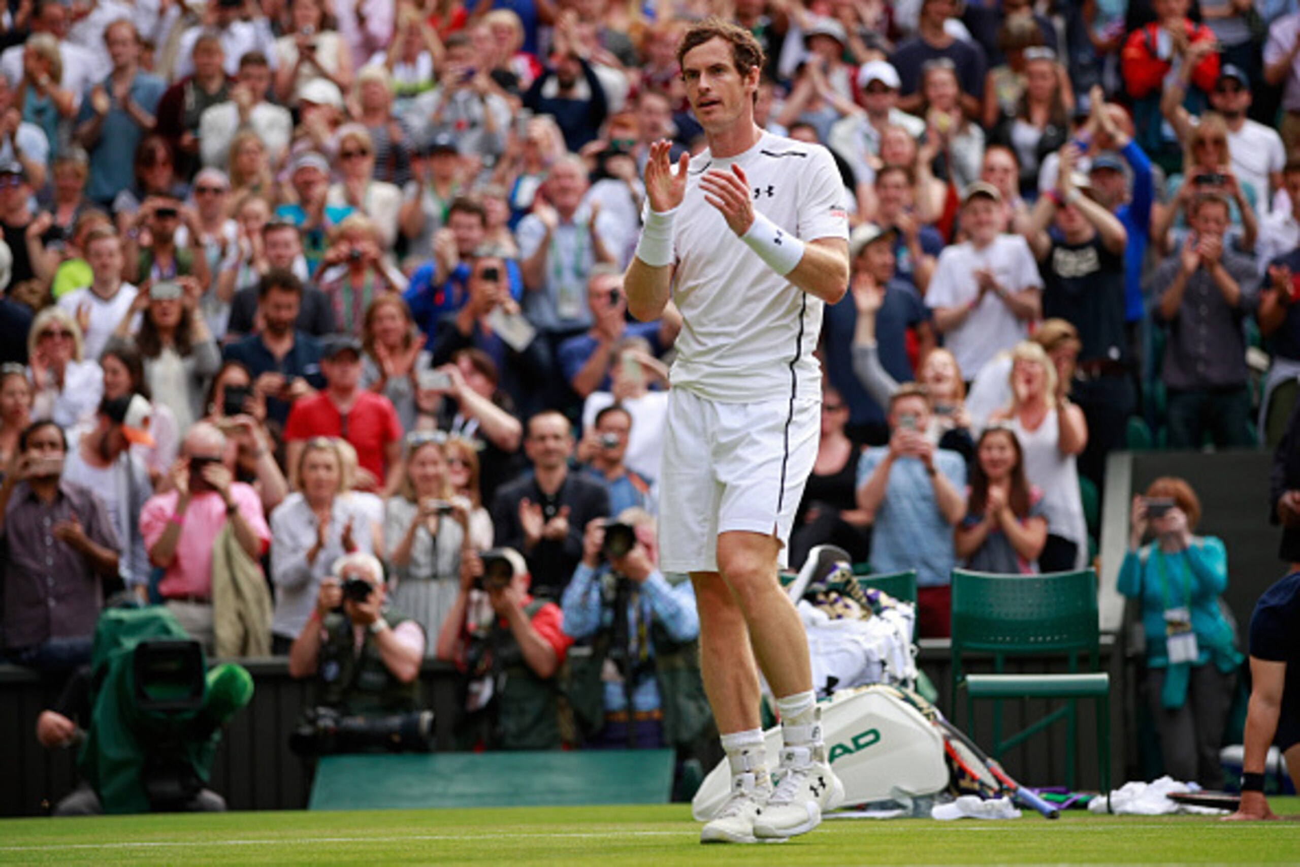 LONDON, ENGLAND - JUNE 30: Andy Murray of Great Britain celebrates victory during the Men's Singles second round match against Yen-Hsun Lu of Taipei on day four of the Wimbledon Lawn Tennis Championships at the All England Lawn Tennis and Croquet Club on LONDON, ENGLAND - JUNE 30: Andy Murray of Great Britain celebrates victory during the Men's Singles second round match against Yen-Hsun Lu of Taipei on day four of the Wimbledon Lawn Tennis Championships at the All England Lawn Tennis and Croquet Club on