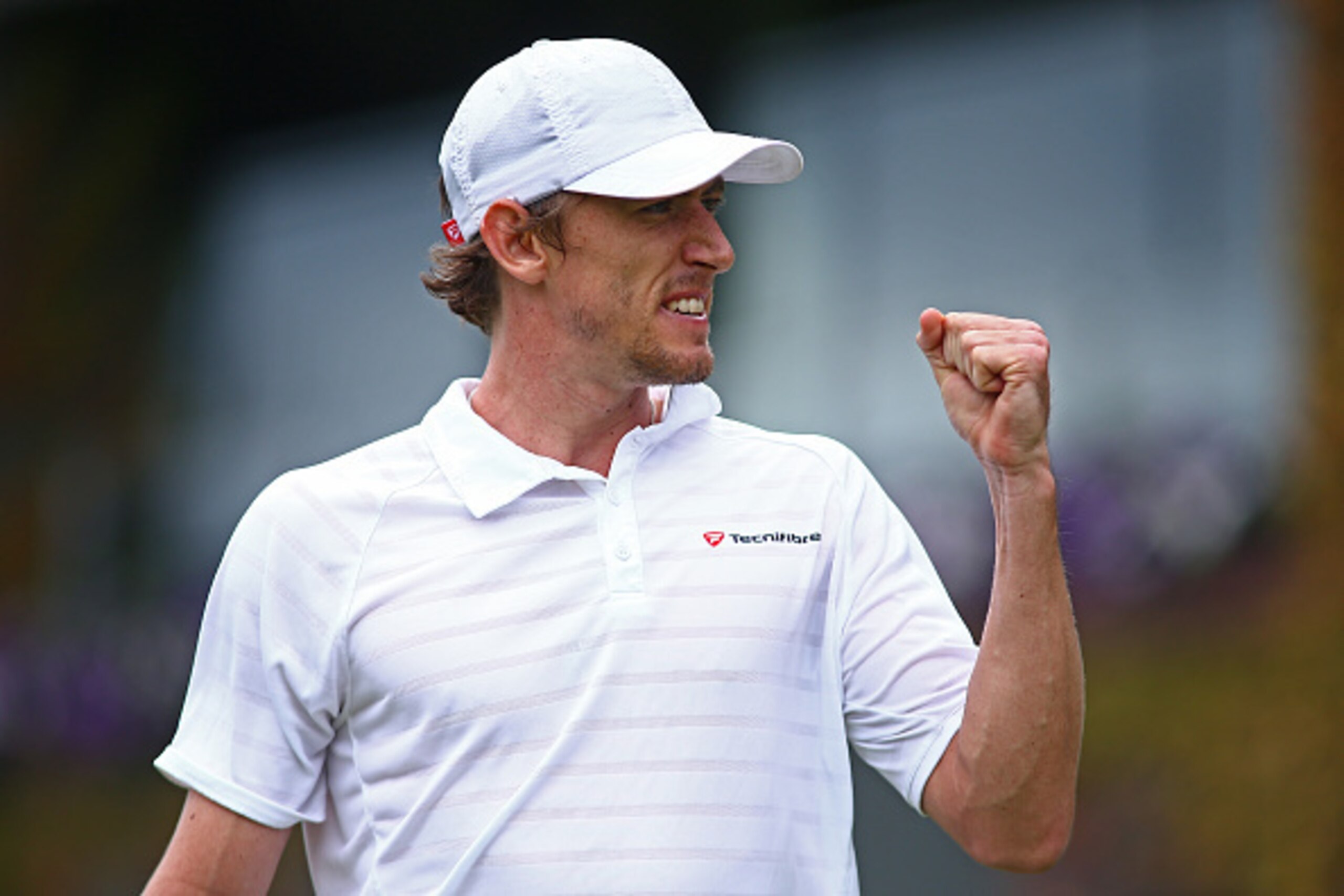 LONDON, ENGLAND - JUNE 30: John Millman of Australia celebrates during the Men's Singles second round match against Benoit Pare of France on day four of the Wimbledon Lawn Tennis Championships at the All England Lawn Tennis and Croquet Club on June 30, 2 LONDON, ENGLAND - JUNE 30: John Millman of Australia celebrates during the Men's Singles second round match against Benoit Pare of France on day four of the Wimbledon Lawn Tennis Championships at the All England Lawn Tennis and Croquet Club on June 30, 2