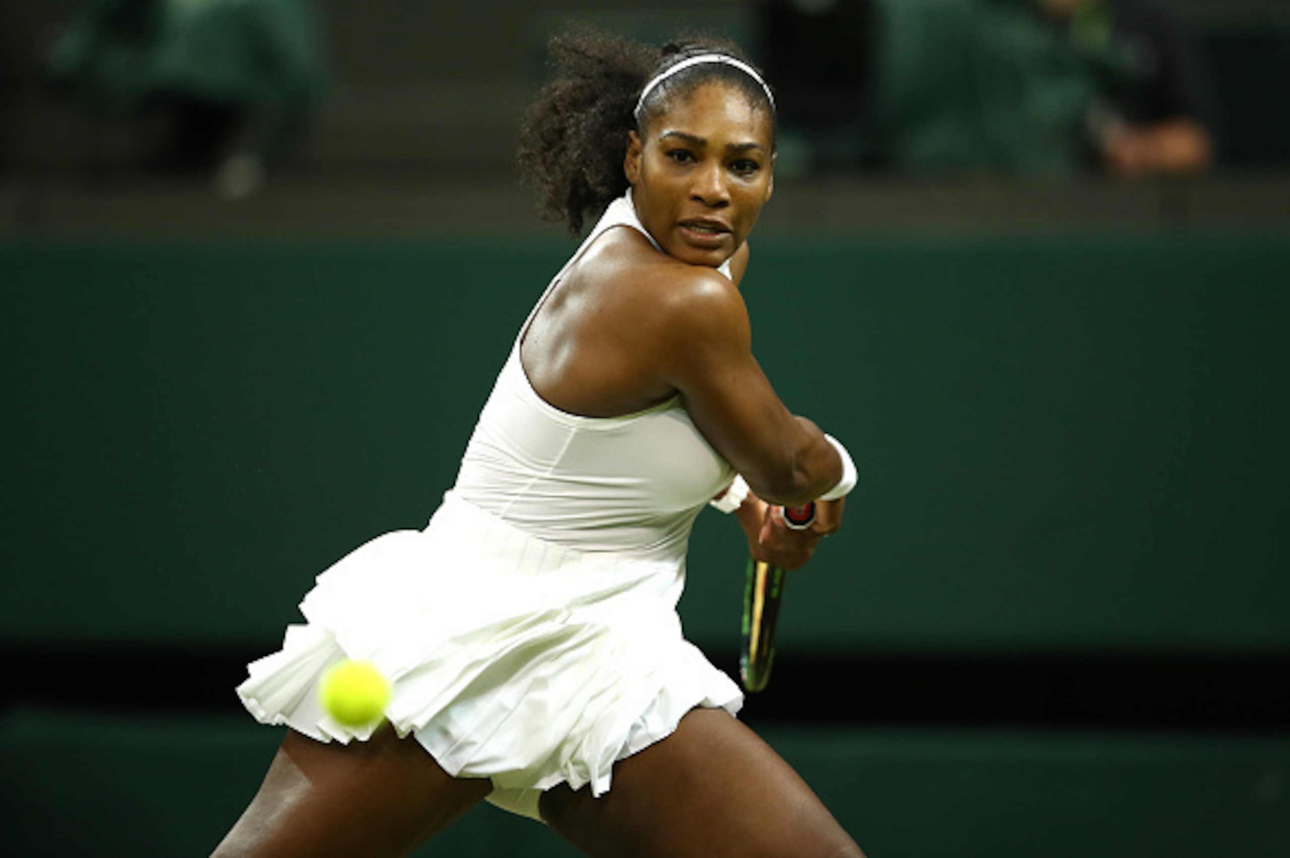 LONDON, ENGLAND - JULY 01:  Serena Williams of The United States plays a backhand during the Ladies Singles second round match against  Christina McHale of the United States on day five of the Wimbledon Lawn Tennis Championships at the All England Lawn Te