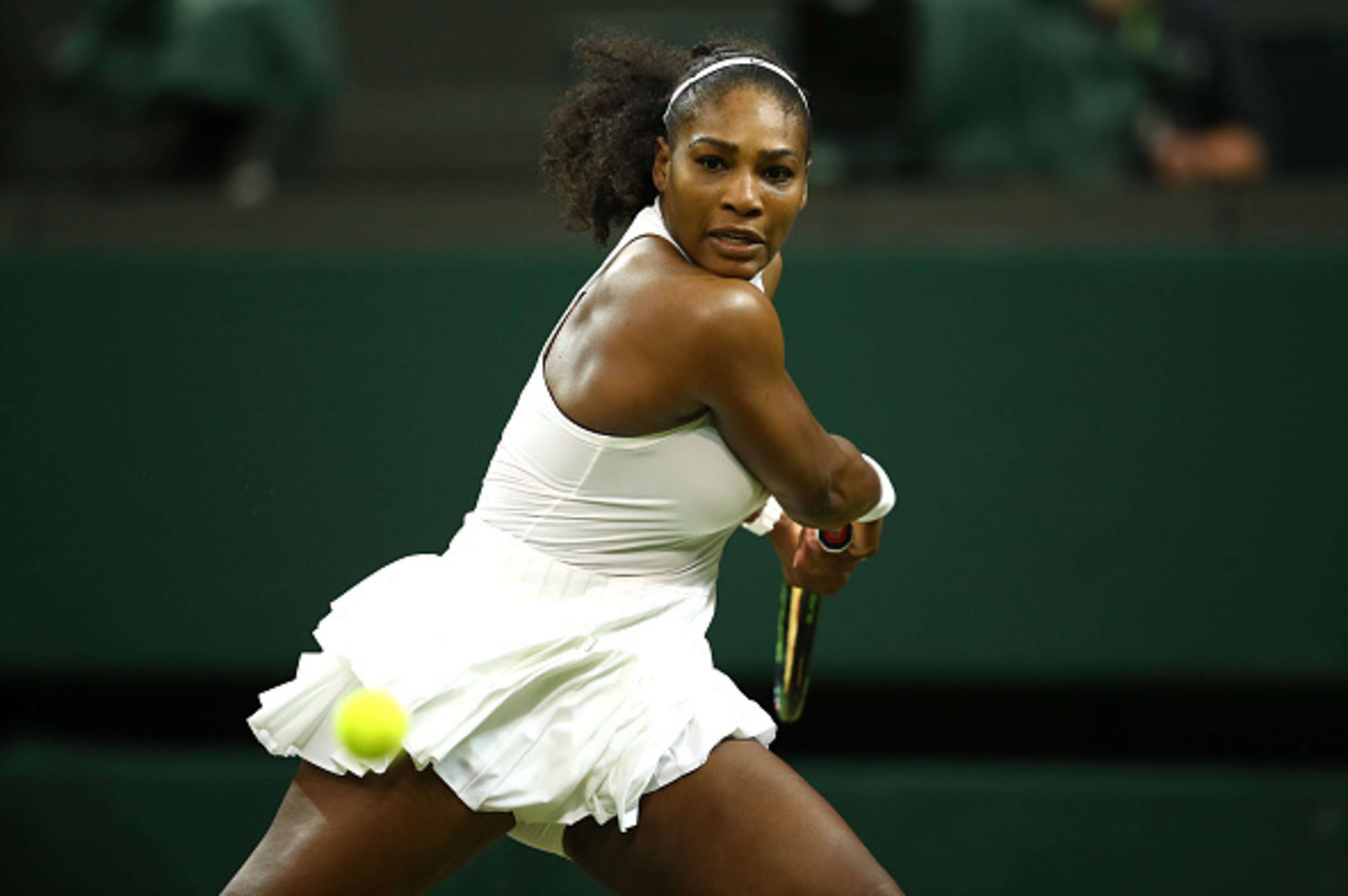 LONDON, ENGLAND - JULY 01: Serena Williams of The United States plays a backhand during the Ladies Singles second round match against Christina McHale of the United States on day five of the Wimbledon Lawn Tennis Championships at the All England Lawn Te LONDON, ENGLAND - JULY 01: Serena Williams of The United States plays a backhand during the Ladies Singles second round match against Christina McHale of the United States on day five of the Wimbledon Lawn Tennis Championships at the All England Lawn Te