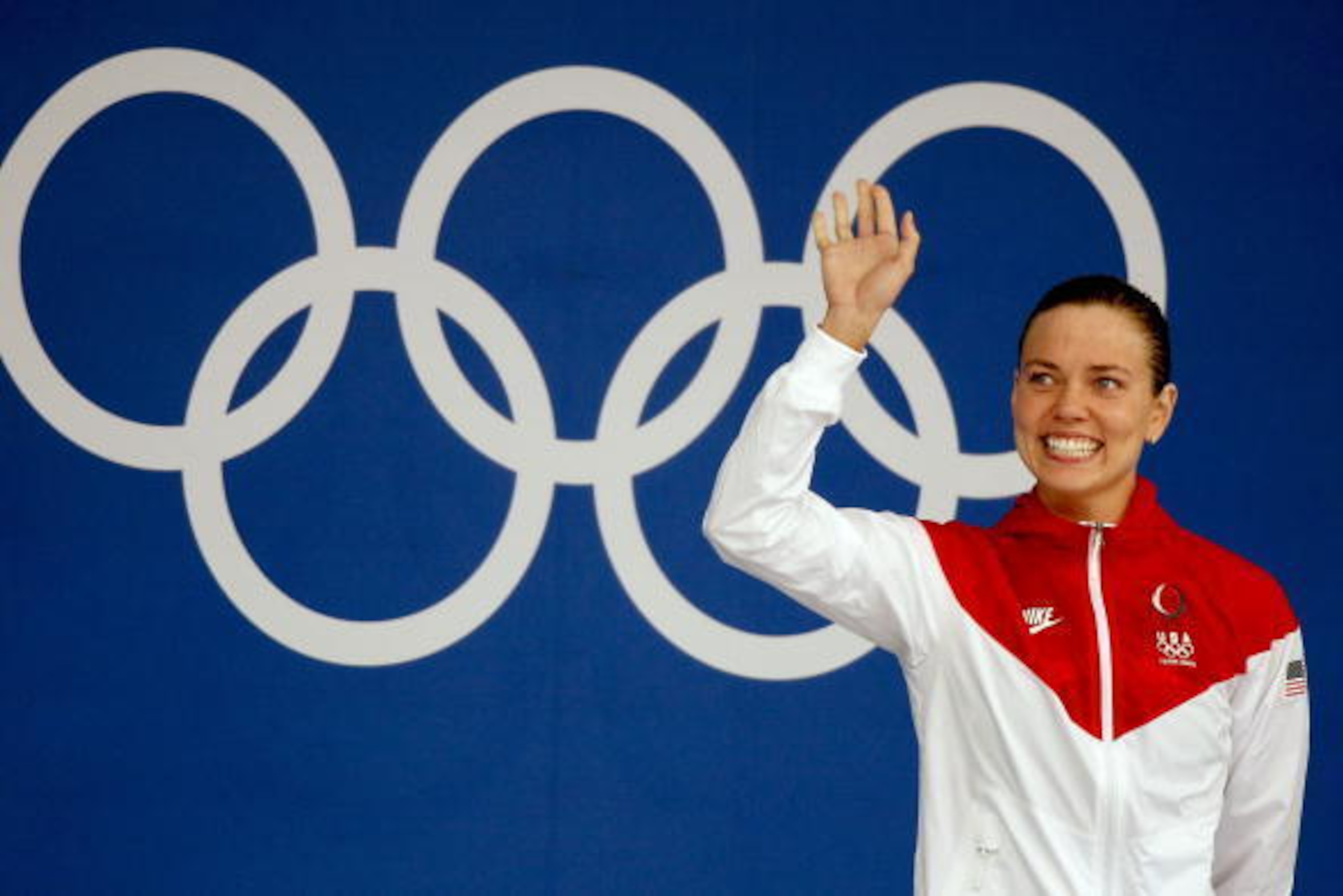 BEIJING - AUGUST 12:  Natalie Coughlin of the United States smiles before receiving her gold medal at the medal ceremony for the Women's 100m Backstroke held at the National Aquatics Center on Day 4 of the Beijing 2008 Olympic Games on August 12, 2008 in 