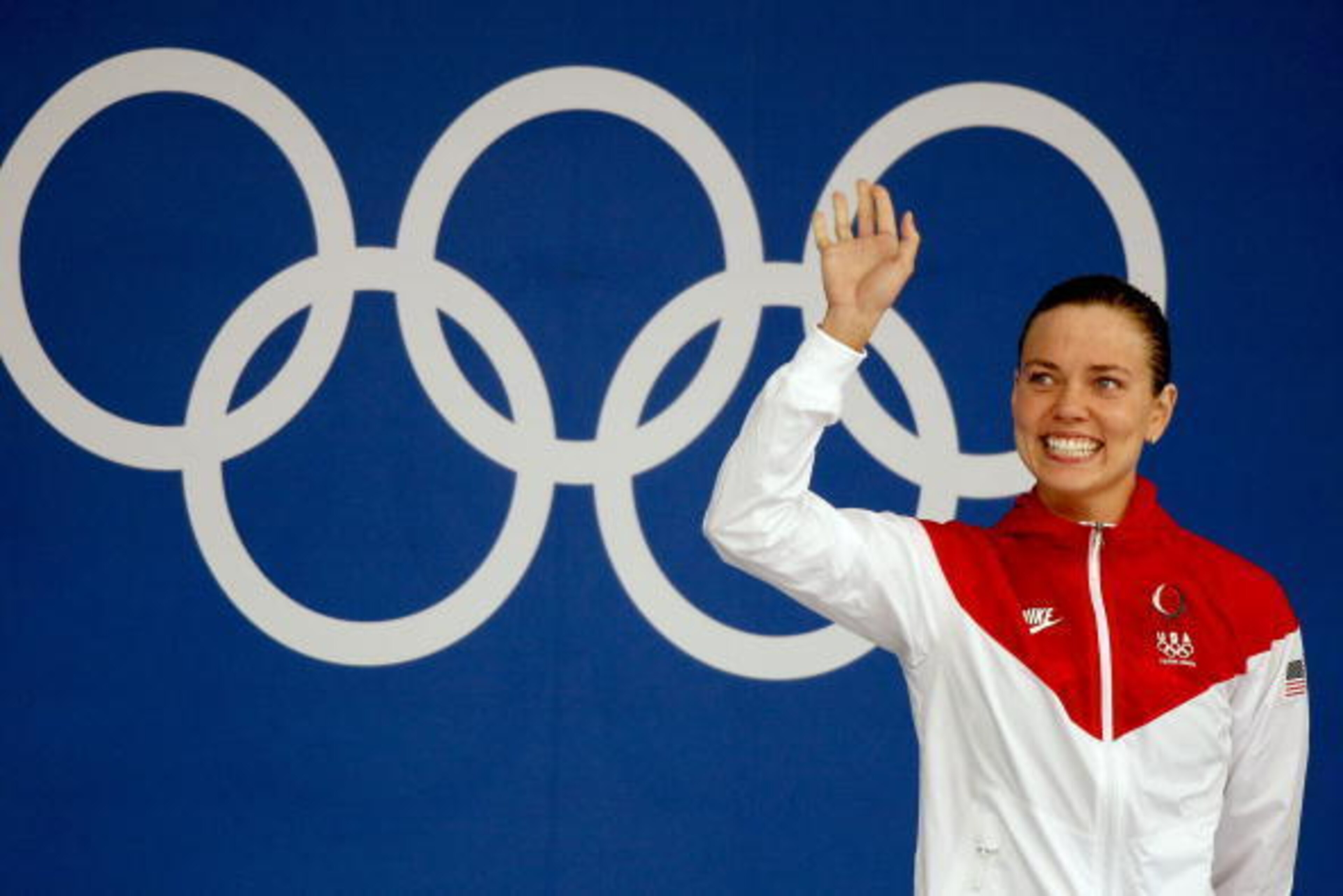BEIJING - AUGUST 12:  Natalie Coughlin of the United States smiles before receiving her gold medal at the medal ceremony for the Women's 100m Backstroke held at the National Aquatics Center on Day 4 of the Beijing 2008 Olympic Games on August 12, 2008 in 
