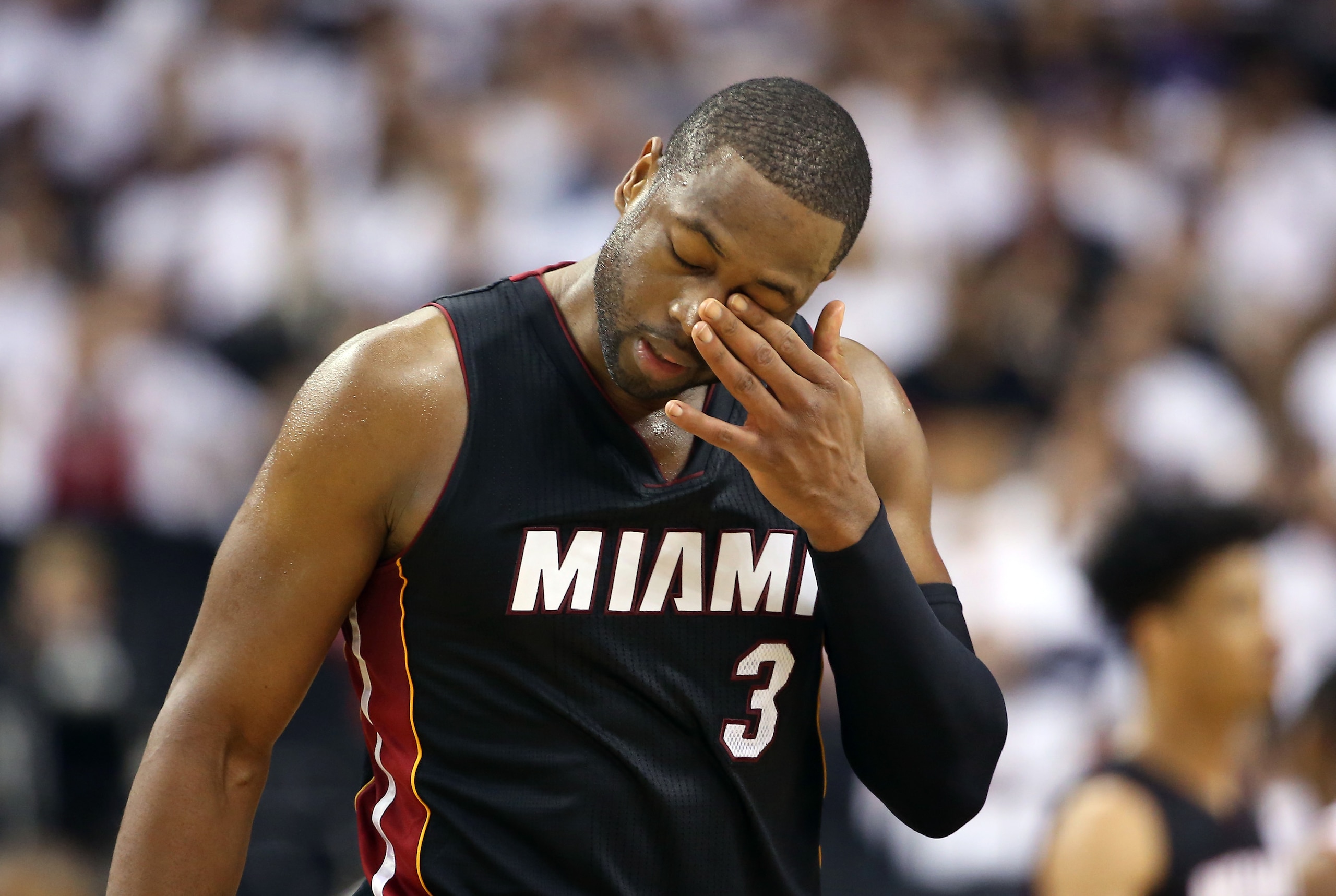 May 11, 2016; Toronto, Ontario, CAN; Miami Heat guard Dwyane Wade (3) reacts after being poked in the eye by Toronto Raptors point guard Cory Joseph (not pictured) in game five of the second round of the NBA Playoffs at Air Canada Centre. The Raptors beat May 11, 2016; Toronto, Ontario, CAN; Miami Heat guard Dwyane Wade (3) reacts after being poked in the eye by Toronto Raptors point guard Cory Joseph (not pictured) in game five of the second round of the NBA Playoffs at Air Canada Centre. The Raptors beat