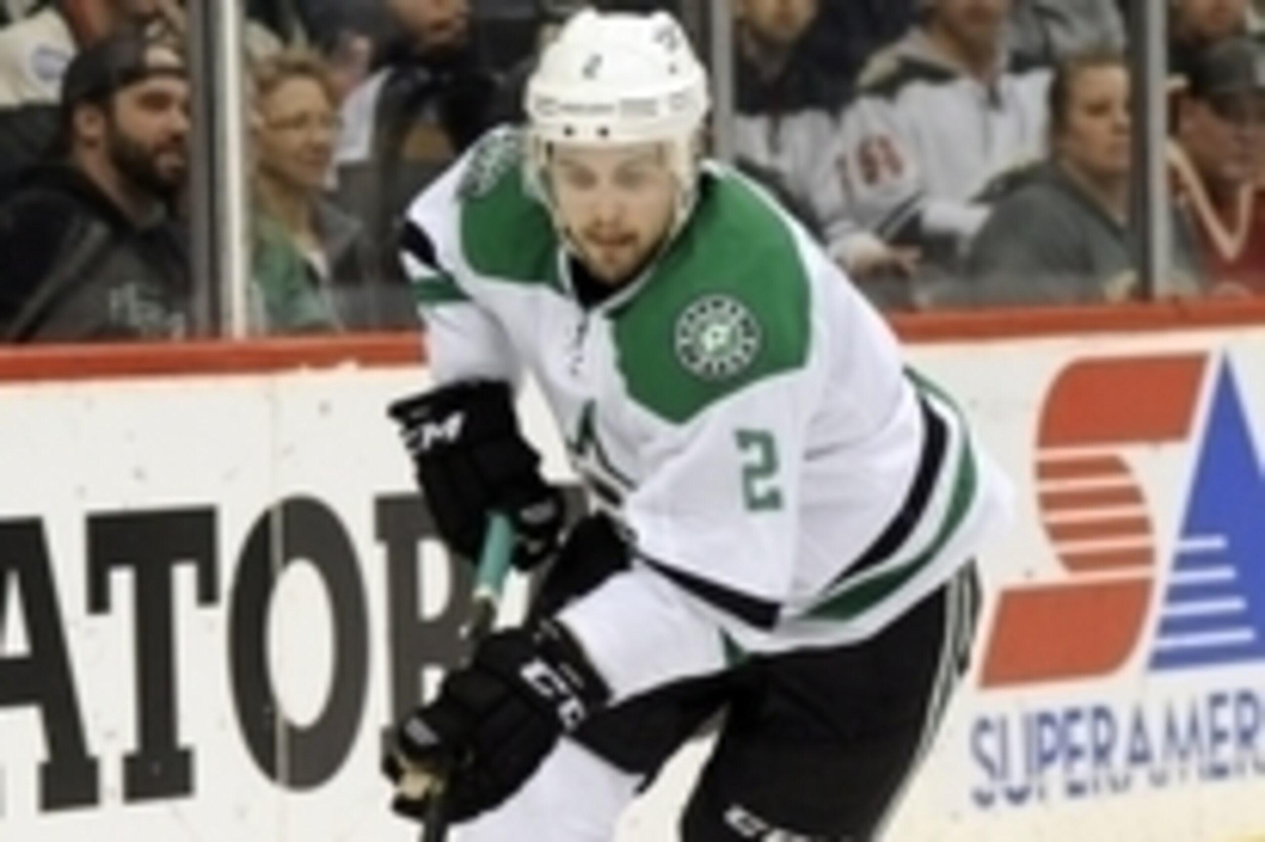 Apr 24, 2016; Saint Paul, MN, USA; Dallas Stars defenseman Kris Russell (2) carries the puck behind the Dallas net during the second period against the Minnesota Wild in game six of the first round of the 2016 Stanley Cup Playoffs at Xcel Energy Center. Apr 24, 2016; Saint Paul, MN, USA; Dallas Stars defenseman Kris Russell (2) carries the puck behind the Dallas net during the second period against the Minnesota Wild in game six of the first round of the 2016 Stanley Cup Playoffs at Xcel Energy Center.