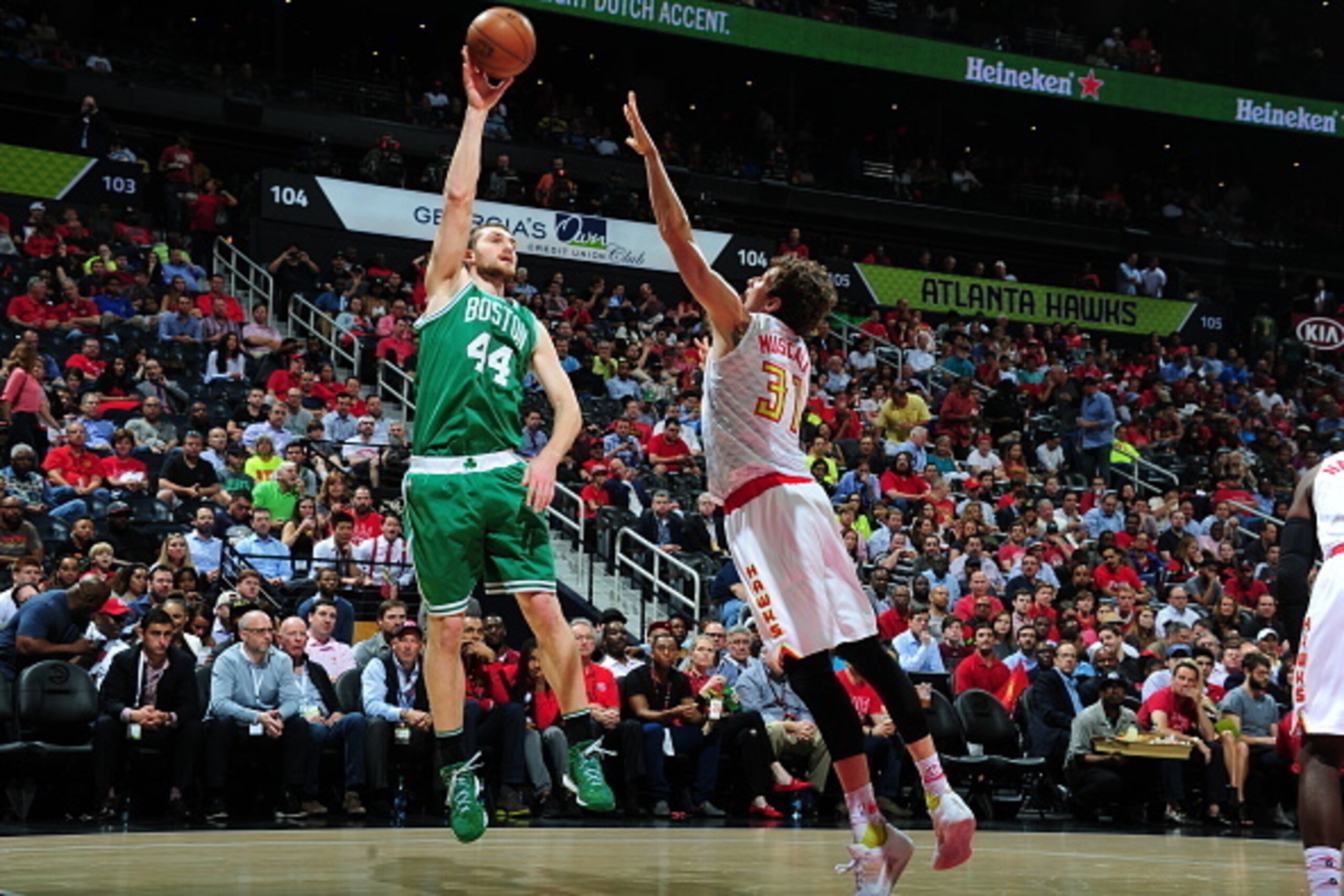 ATLANTA, GA - APRIL 19:  Tyler Zeller #44 of the Boston Celtics shoots against Mike Muscala #31 of the Atlanta Hawks in Game Two of the Eastern Conference Quarterfinals during the 2016 NBA Playoffs on April 19, 2016 at Philips Arena in Atlanta, Georgia.  