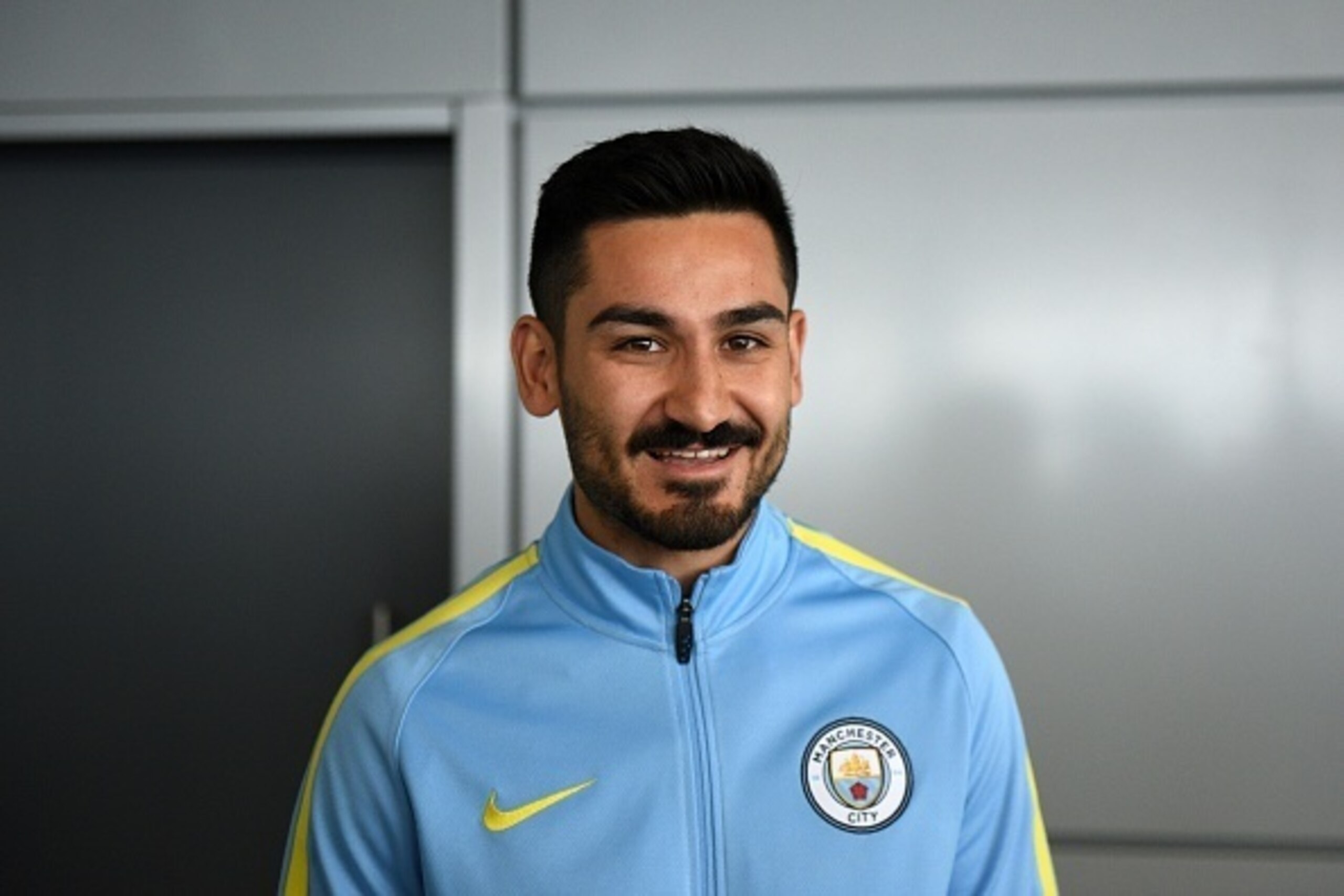 Manchester City's German midfielder Ilkay Gundogan arrives to meet members of the media at the City Football Academy in Manchester, north west England on July 3, 2016.
llkay Gundogan is the first signing of the Pep Guardiola era. The 25-year-old German mi