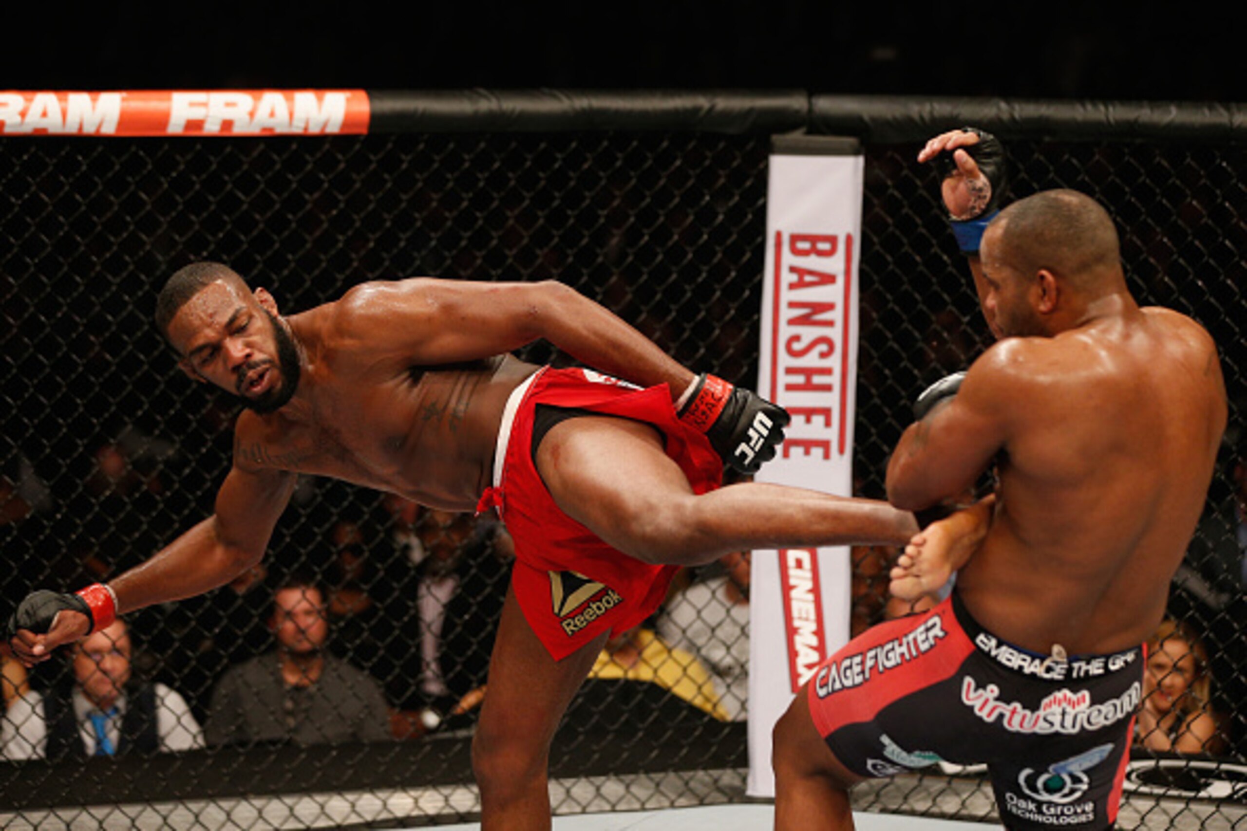 LAS VEGAS, NV - JANUARY 03: Jon Jones (L) kicks Daniel Cormier (R) in their UFC light heavyweight championship bout during the UFC 182 event at the MGM Grand Garden Arena on January 3, 2015 in Las Vegas, Nevada. (Photo by Josh Hedges/Zuffa LLC/Zuffa LLC LAS VEGAS, NV - JANUARY 03: Jon Jones (L) kicks Daniel Cormier (R) in their UFC light heavyweight championship bout during the UFC 182 event at the MGM Grand Garden Arena on January 3, 2015 in Las Vegas, Nevada. (Photo by Josh Hedges/Zuffa LLC/Zuffa LLC