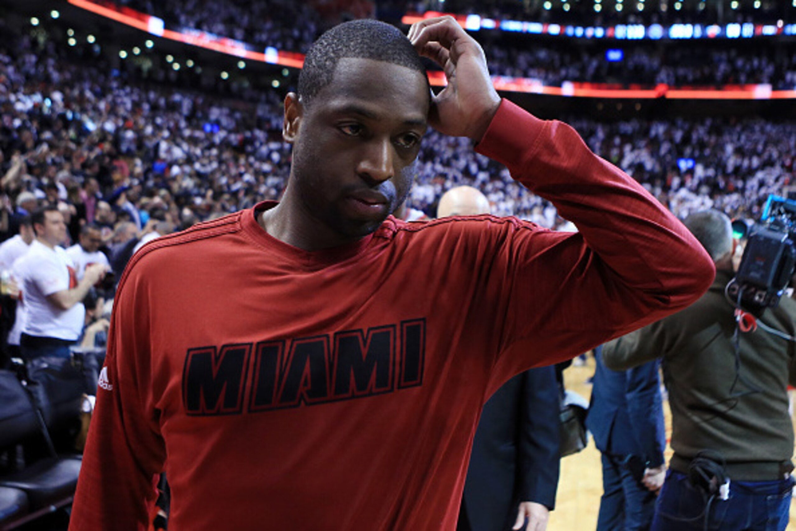 TORONTO, ON - MAY 15:  Dwyane Wade #3 of the Miami Heat walks off the court following Game Seven of the Eastern Conference Quarterfinals against the Toronto Raptors during the 2016 NBA Playoffs at the Air Canada Centre on May 15, 2016 in Toronto, Ontario,