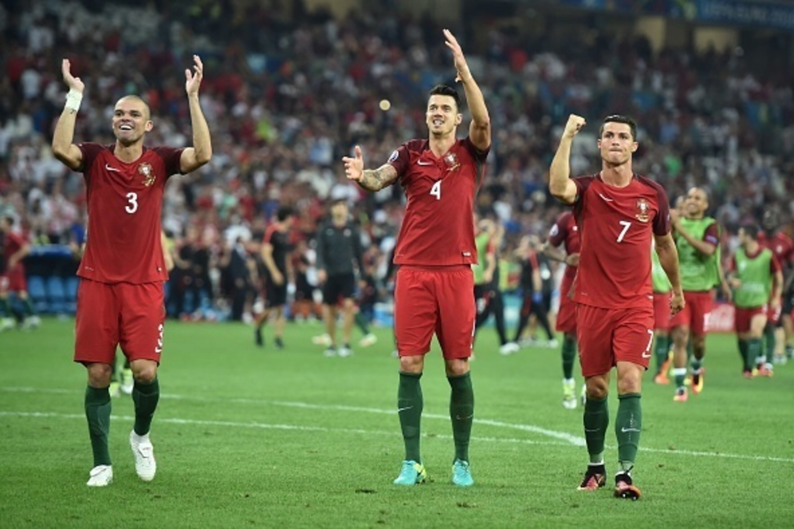 (From L) Portugal's defender Pepe, Portugal's defender Fonte and Portugal's forward Cristiano Ronaldo celebrate after winning the Euro 2016 quarter-final football match between Poland and Portugal at the Stade Velodrome in Marseille on June 30, 2016.  / A