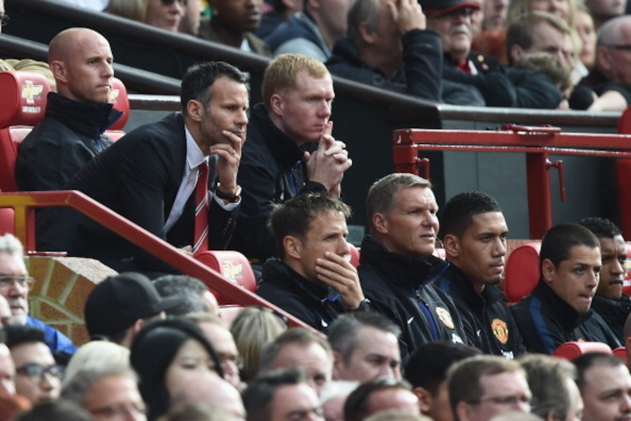 MANCHESTER, ENGLAND - APRIL 26:  Ryan Giggs of Manchester United looks on from the dug out during the Barclays Premier League match between Manchester United and Norwich City at Old Trafford on April 26, 2014 in Manchester, England.  (Photo by Laurence Gr