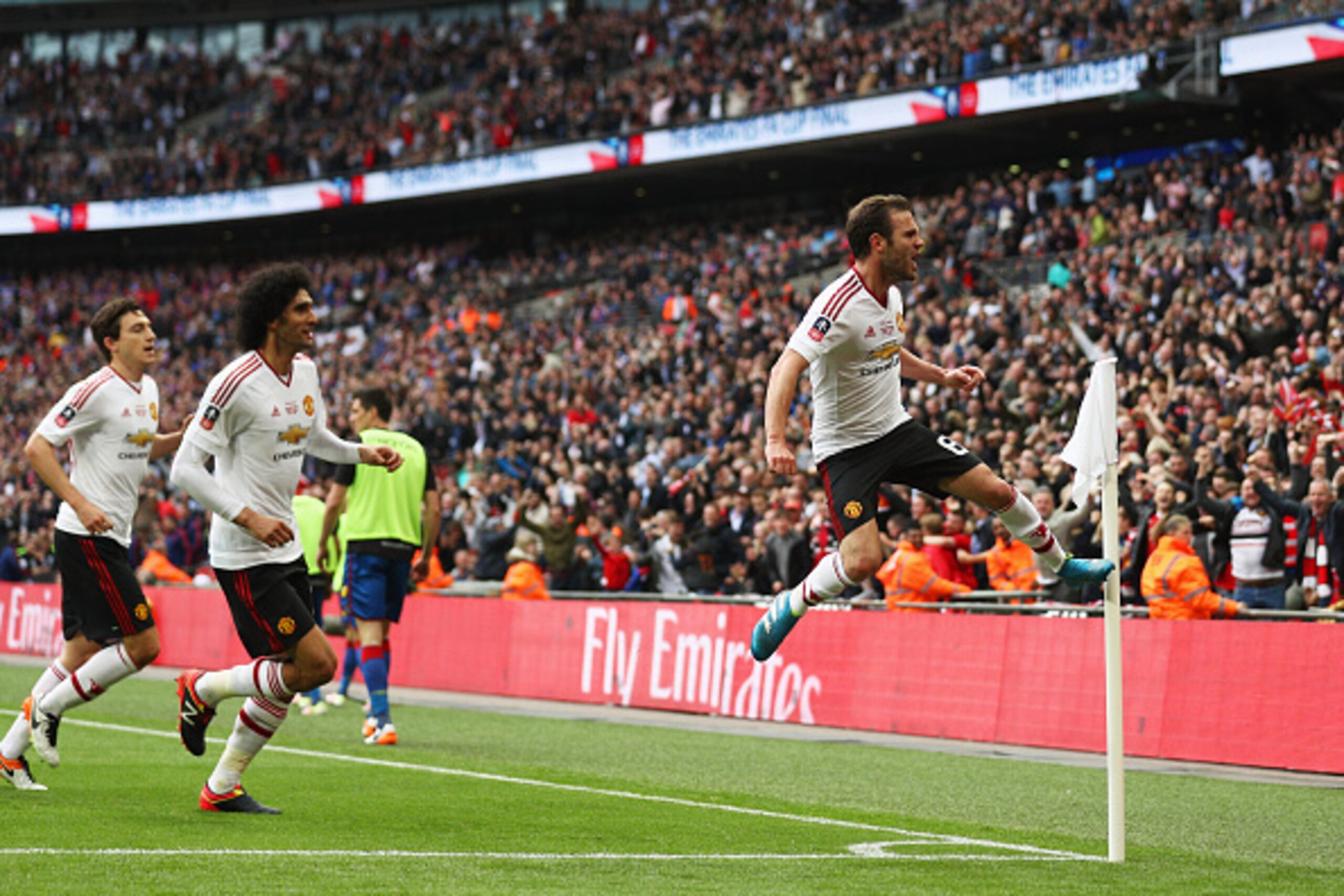 LONDON, ENGLAND - MAY 21:  Juan Mata of Manchester United celebrates as he scores their first goal during The Emirates FA Cup Final match between Manchester United and Crystal Palace at Wembley Stadium on May 21, 2016 in London, England.  (Photo by Paul G