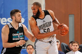 ORLANDO, FL - JULY 2: Arinze Onuaku #50 of the Orlando Magic White defends the ball against the Charlotte Hornets during the 2016 Southwest Airlines Orlando Pro Summer League on July 2, 2016 at Amway Center in Orlando, Florida. NOTE TO USER: User expressl