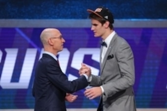 Jun 23, 2016; New York, NY, USA; Dragan Bender (right) greets NBA commissioner Adam Silver after being selected as the number four overall pick to the Phoenix Suns in the first round of the 2016 NBA Draft at Barclays Center. Mandatory Credit: Brad Penner-