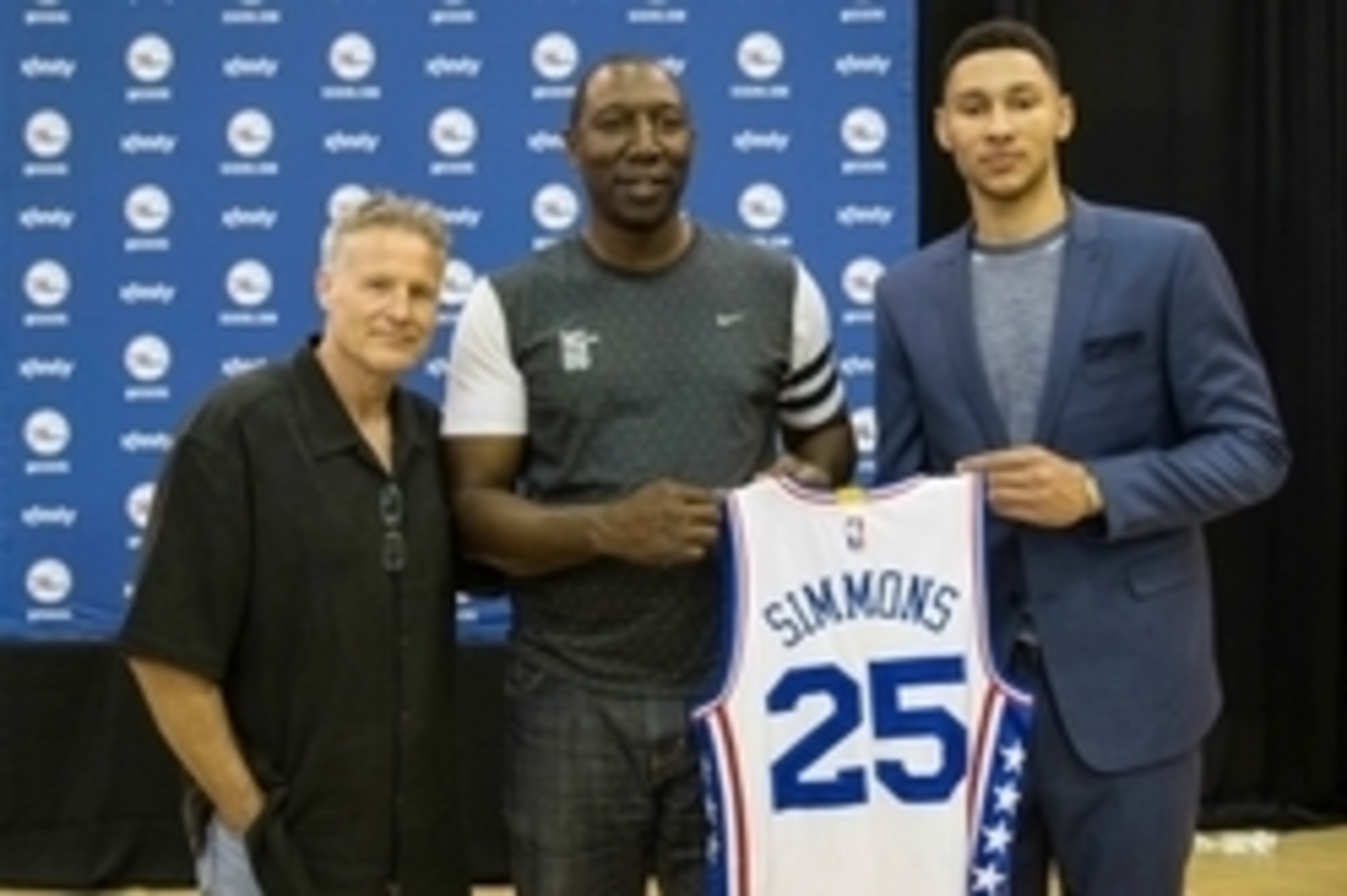 Jun 24, 2016; Philadelphia, PA, USA; Philadelphia 76ers number one overall draft pick Ben Simmons (R) and his father David Simmons (M) and head coach Brett Brown (L) during an introduction press conference at the Philadelphia College Of Osteopathic Medici