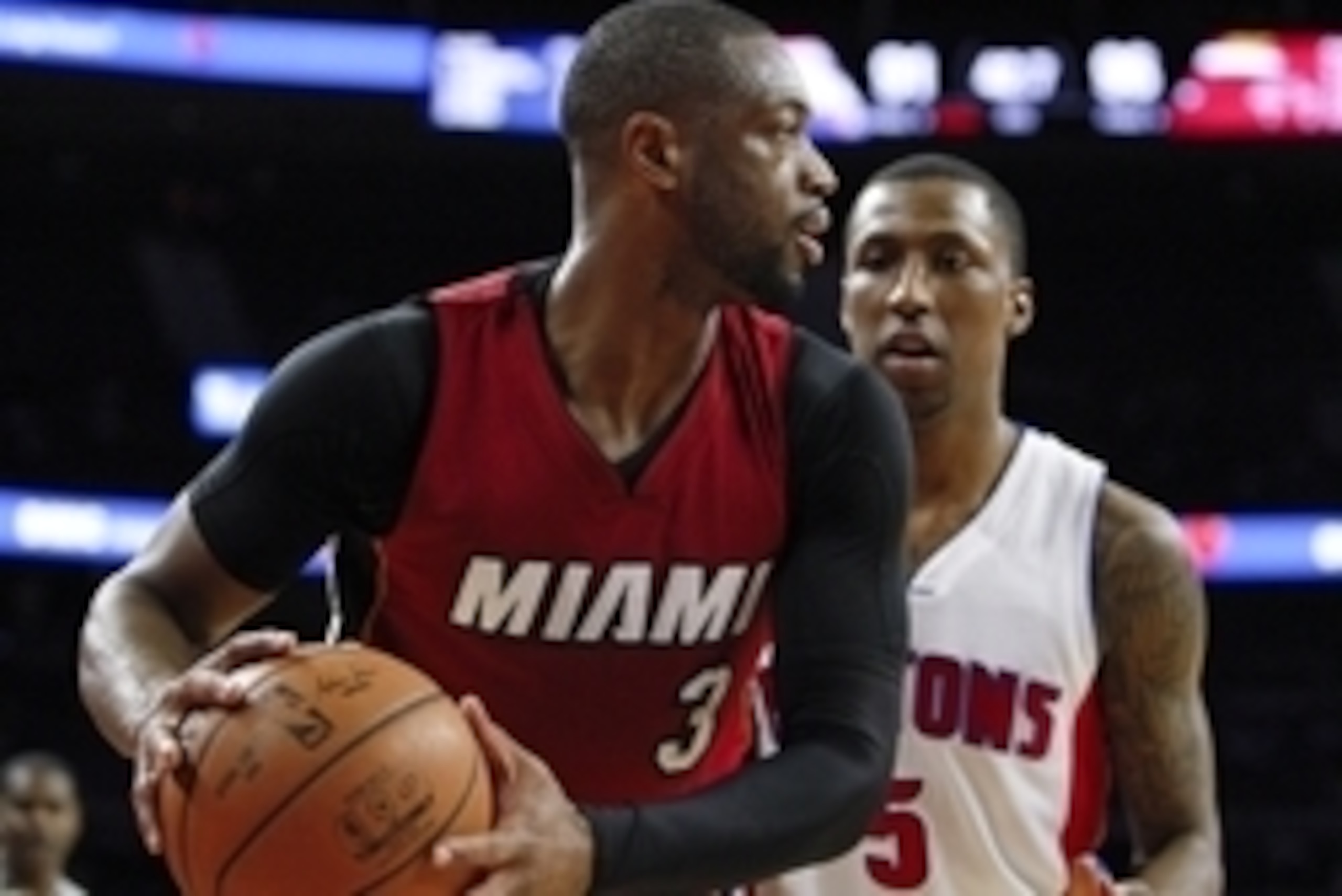 Apr 12, 2016; Auburn Hills, MI, USA; Miami Heat guard Dwyane Wade (3) is defended by Detroit Pistons guard Kentavious Caldwell-Pope (5) during the fourth quarter at The Palace of Auburn Hills. Heat win 99-93. Mandatory Credit: Raj Mehta-USA TODAY Sports