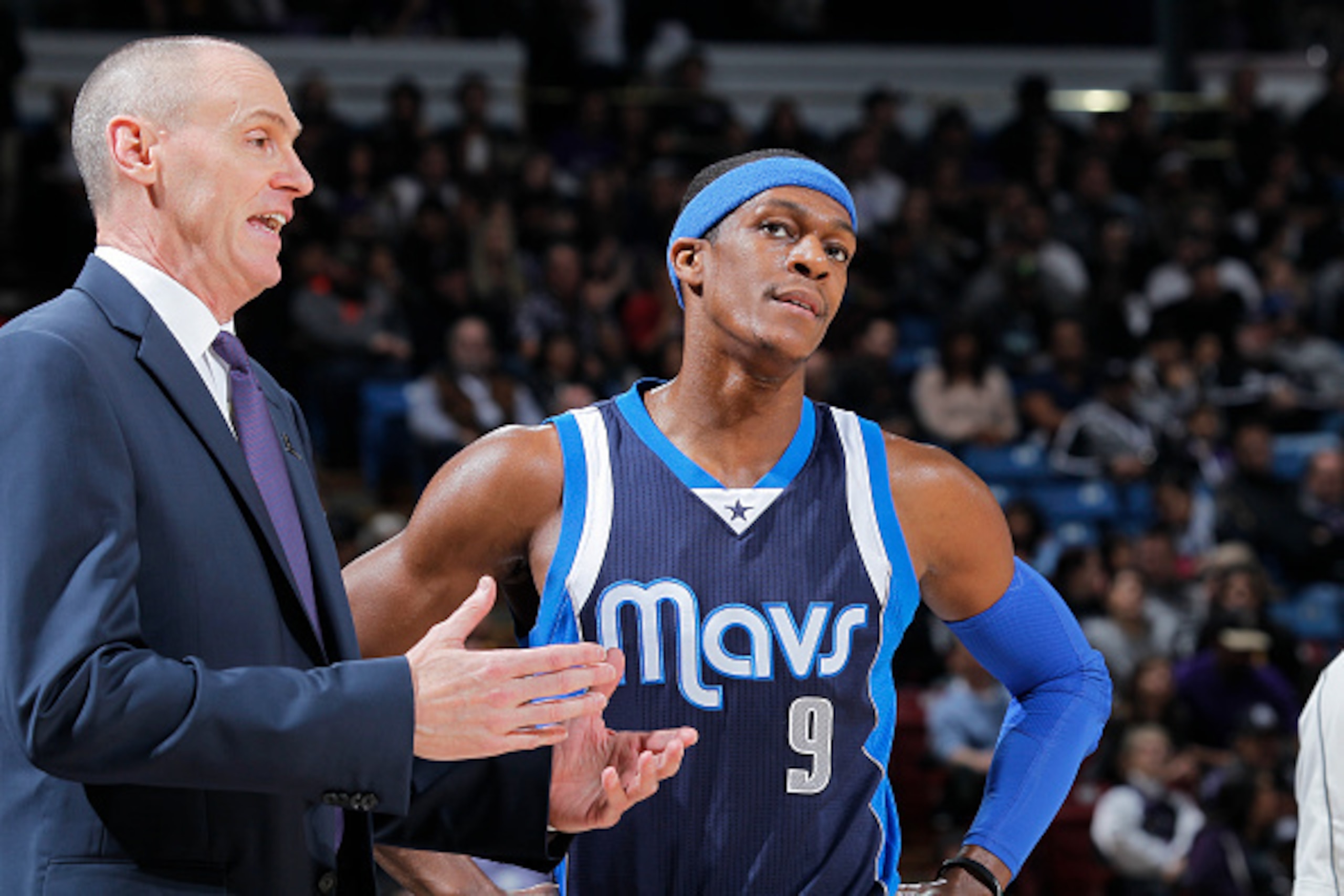 SACRAMENTO, CA - JANUARY 13: Head Coach Rick Carlisle of the Dallas Mavericks coaches Rajon Rondo #9 against the Sacramento Kings on January 13, 2015 at Sleep Train Arena in Sacramento, California. NOTE TO USER: User expressly acknowledges and agrees that