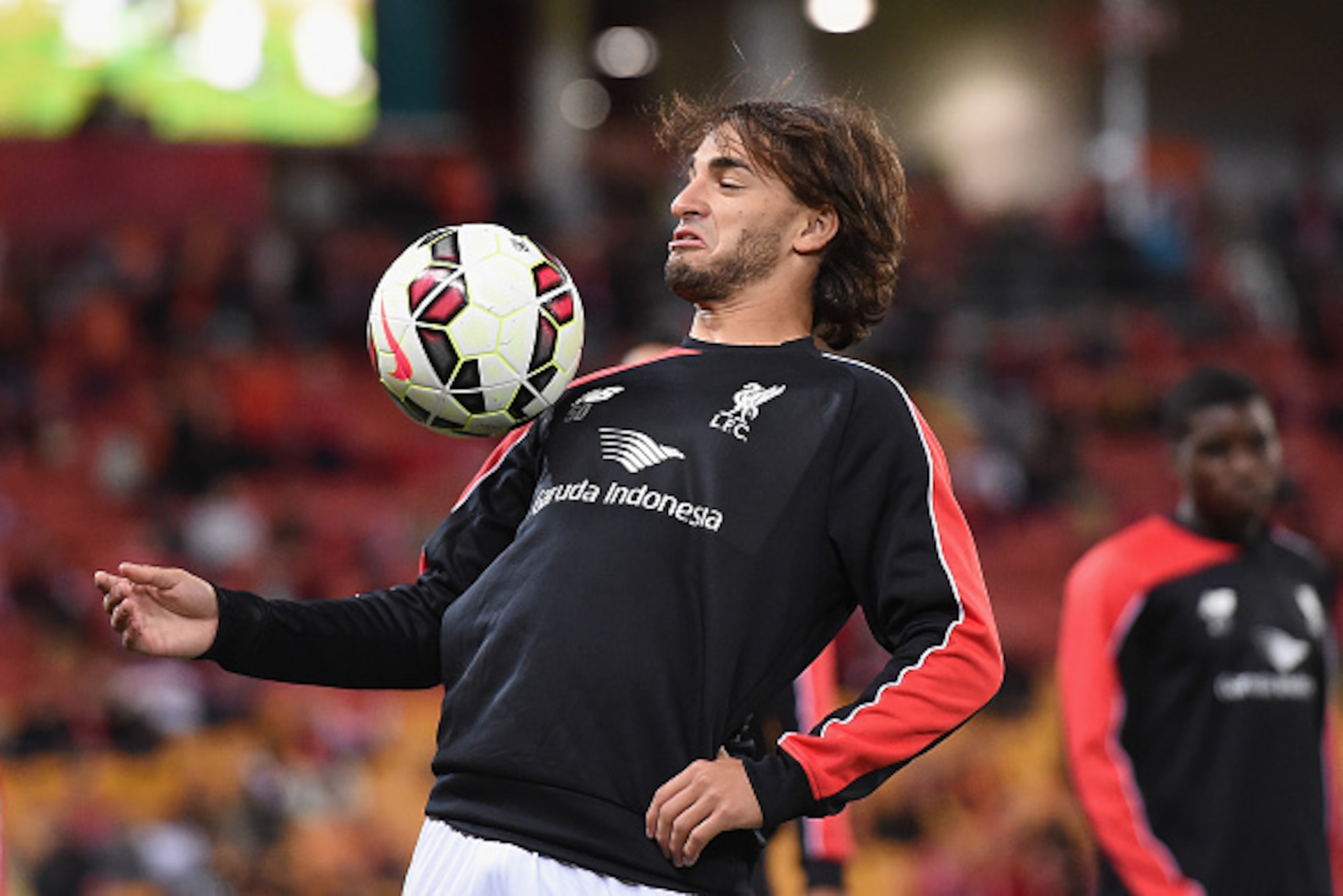 BRISBANE, AUSTRALIA - JULY 17: Lazar Markovic of Liverpool warms up on the field before the international friendly match between Brisbane Roar and Liverpool FC at Suncorp Stadium on July 17, 2015 in Brisbane, Australia.  (Photo by Matt Roberts/Getty Image