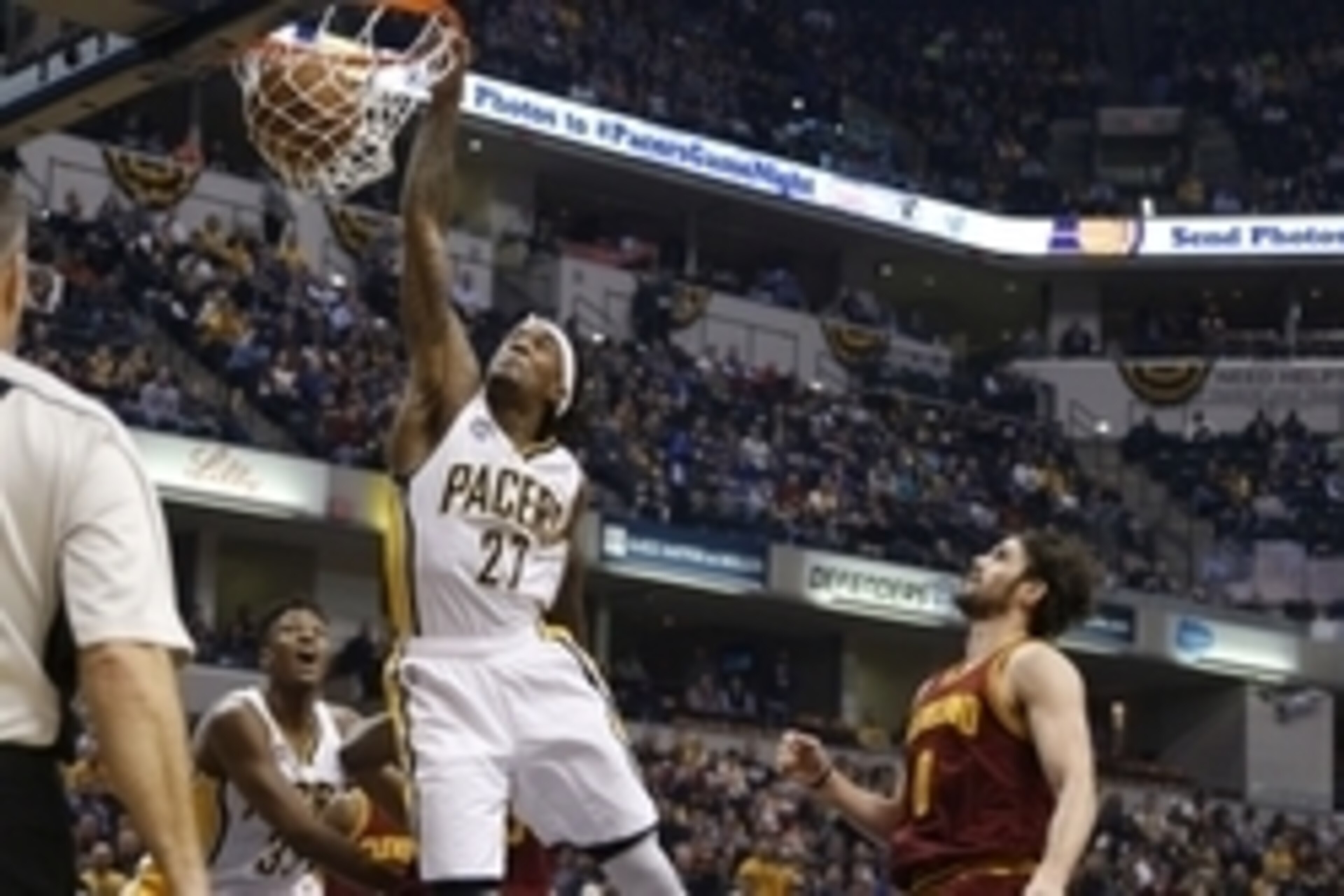 Feb 1, 2016; Indianapolis, IN, USA; Indiana Pacers center Jordan Hill (27) dunks the ball past Cleveland Cavaliers forward Kevin Love (0) during the first half at Bankers Life Fieldhouse. Mandatory Credit: Brian Spurlock-USA TODAY Sports