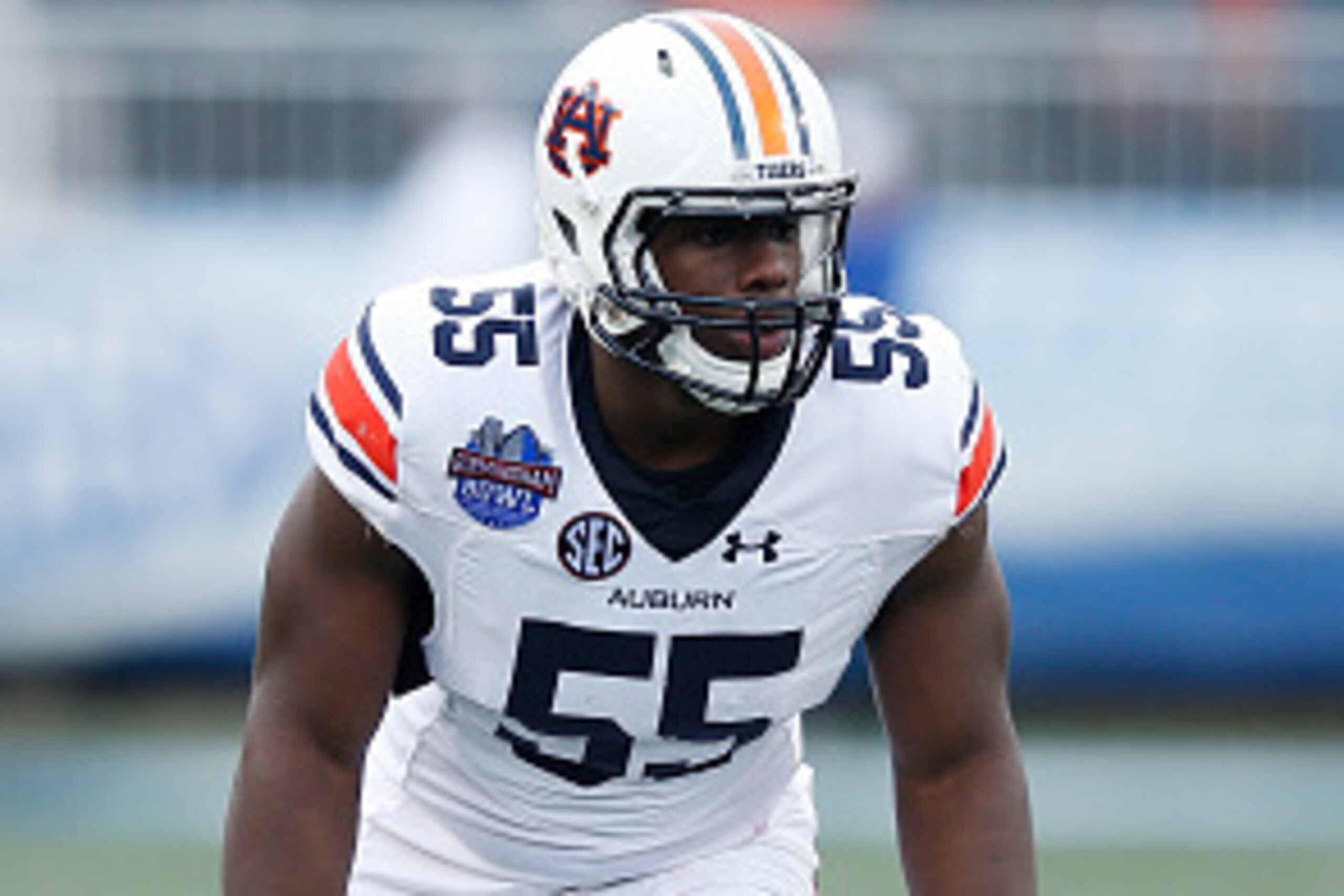 BIRMINGHAM, AL - DECEMBER 30: Carl Lawson #55 of the Auburn Tigers in action against the Memphis Tigers during the Birmingham Bowl at Legion Field on December 30, 2015 in Birmingham, Alabama. Auburn defeated Memphis 31-10. (Photo by Joe Robbins/Getty Imag