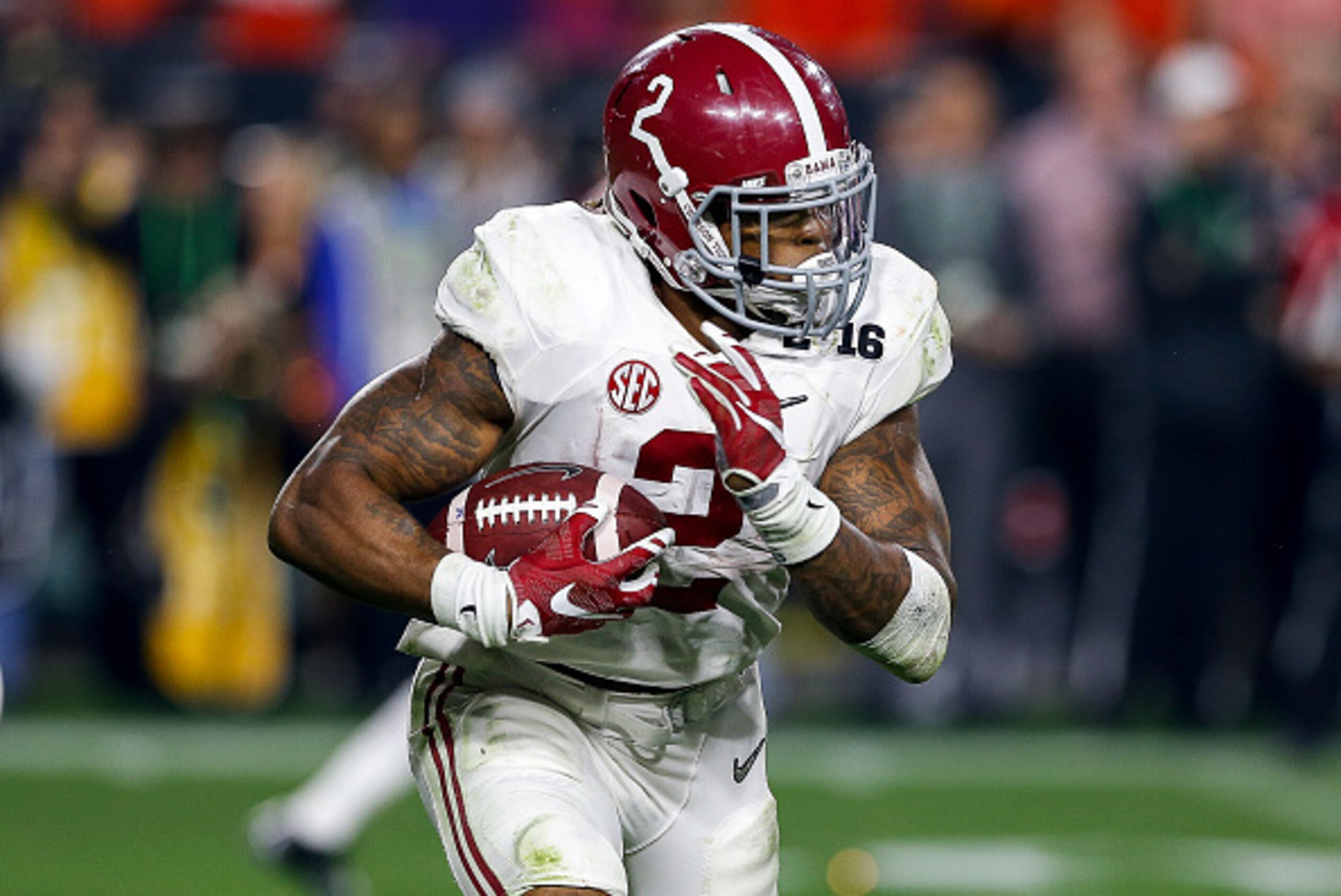 GLENDALE, AZ - JANUARY 11: Alabama Crimson Tide Runningback Derrick Henry #2 on a running play during the College Football National Championship Game against the Clemson Tigers at University of Phoenix Stadium on January 11, 2016 in Glendale, Arizona. The