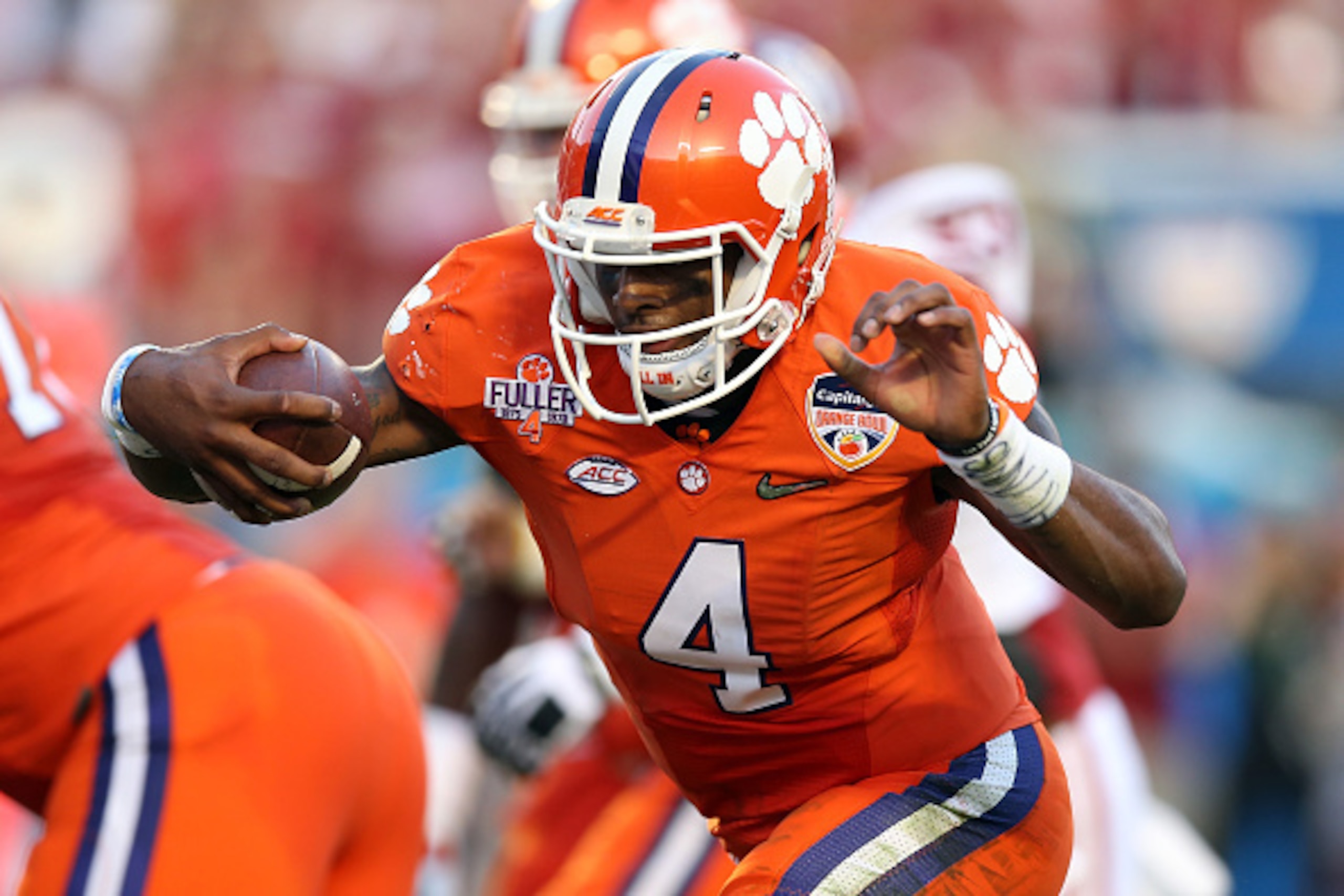 MIAMI GARDENS, FL - DECEMBER 31:  Deshaun Watson #4 of the Clemson Tigers runs with the ball against the Oklahoma Sooners in the second quarter during the 2015 Capital One Orange Bowl at Sun Life Stadium on December 31, 2015 in Miami Gardens, Florida.  (P