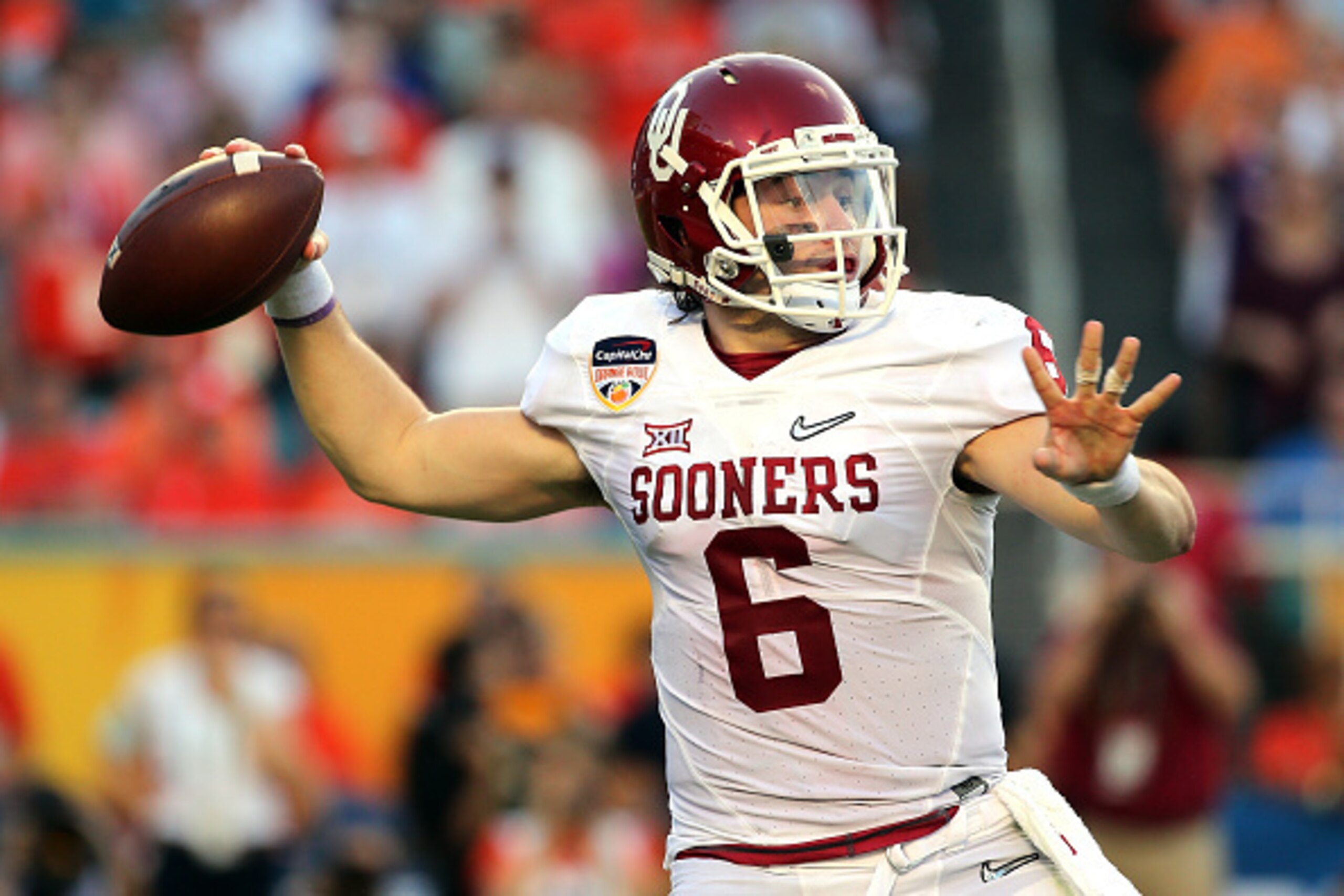 MIAMI GARDENS, FL - DECEMBER 31:  Baker Mayfield #6 of the Oklahoma Sooners throws a pass against the Clemson Tigers in the first quarter during the 2015 Capital One Orange Bowl at Sun Life Stadium on December 31, 2015 in Miami Gardens, Florida.  (Photo b