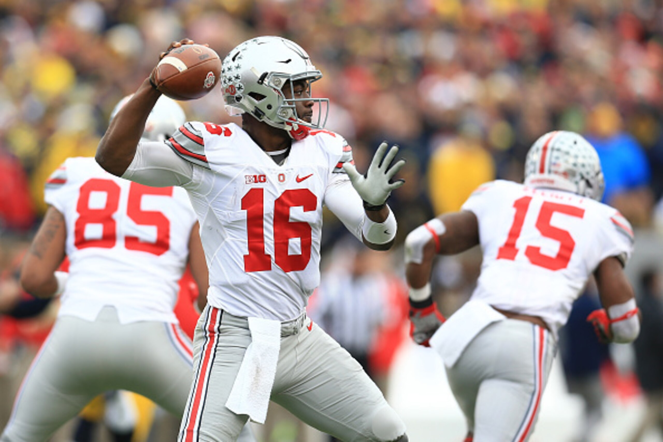 ANN ARBOR, MI - NOVEMBER 28: Quarterback J.T. Barrett #16 of the Ohio State Buckeyes drops back to pass against the Michigan Wolverines at Michigan Stadium on November 28, 2015 in Ann Arbor, Michigan. Ohio State defeated Michigan 42-13. (Photo by Andrew W
