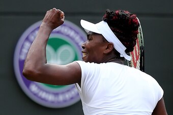 US player Venus Williams celebrates beating Kazakhstan's Yaroslava Shvedova during their women's singles quarter-final match on the ninth day of the 2016 Wimbledon Championships at The All England Lawn Tennis Club in Wimbledon, southwest London, on July 5