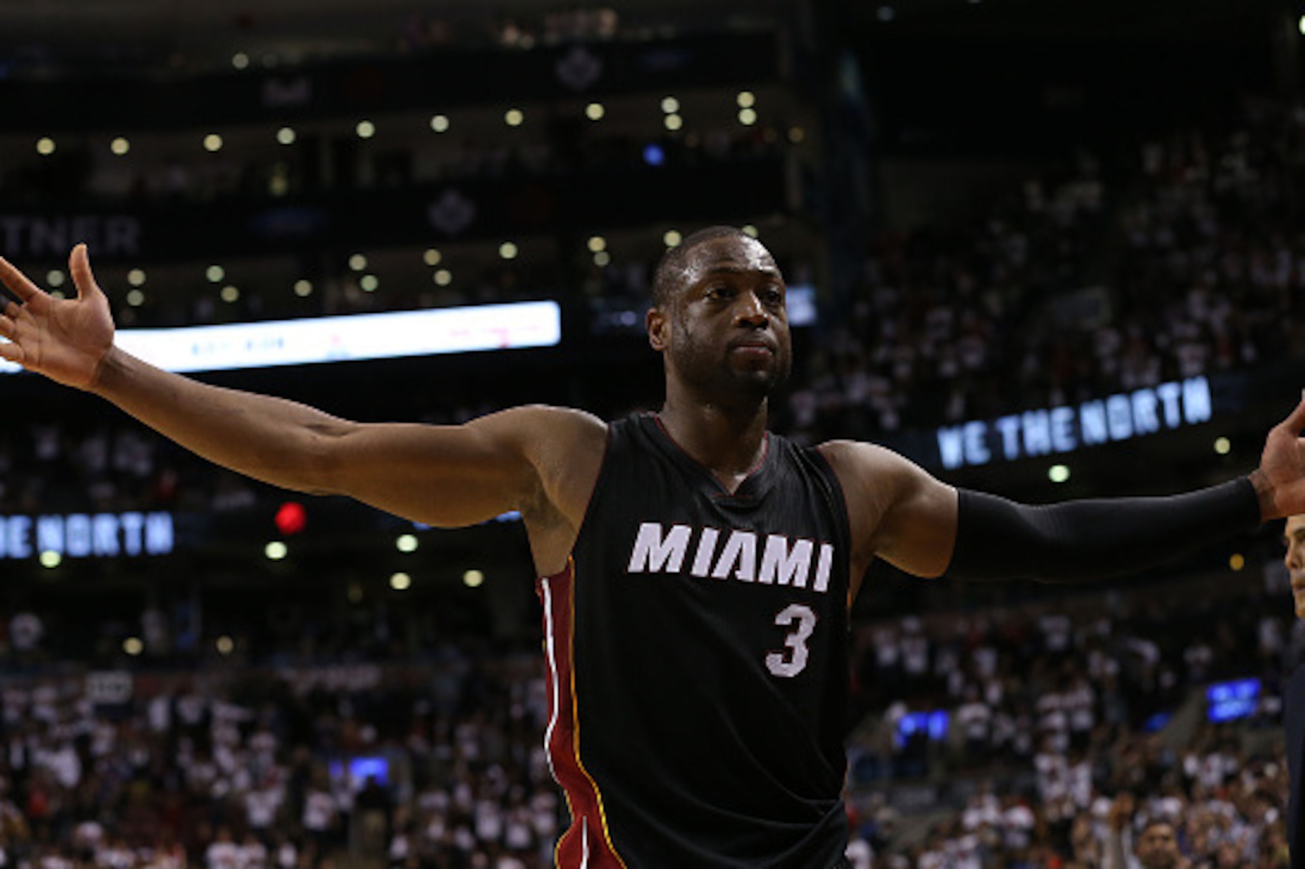 TORONTO, CAN - MAY 3:  Dwyane Wade #3 of the Miami Heat celebrates after sinking a basket against the Toronto Raptors during Game One of the NBA Eastern Conference Semi Finals at Air Canada Centre on May 3, 2016 in Toronto, Ontario, Canada. NOTE TO USER: 