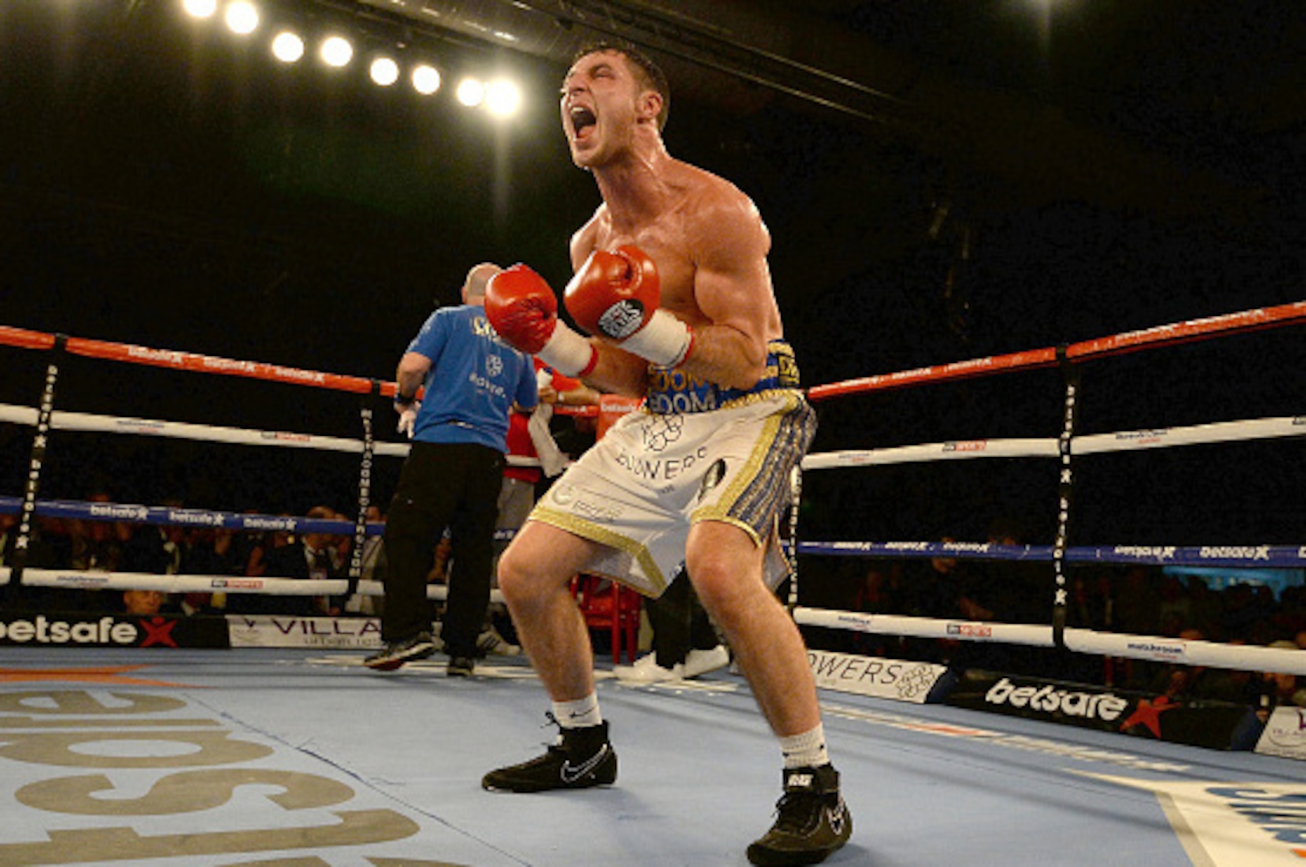 HULL, ENGLAND - MARCH 07:  Tommy Coyle celebrates beating Martin Gethin after their Lightweight contest at The Hull Arena on March 7, 2015 in Hull, England.  (Photo by Nigel Roddis/Getty Images)