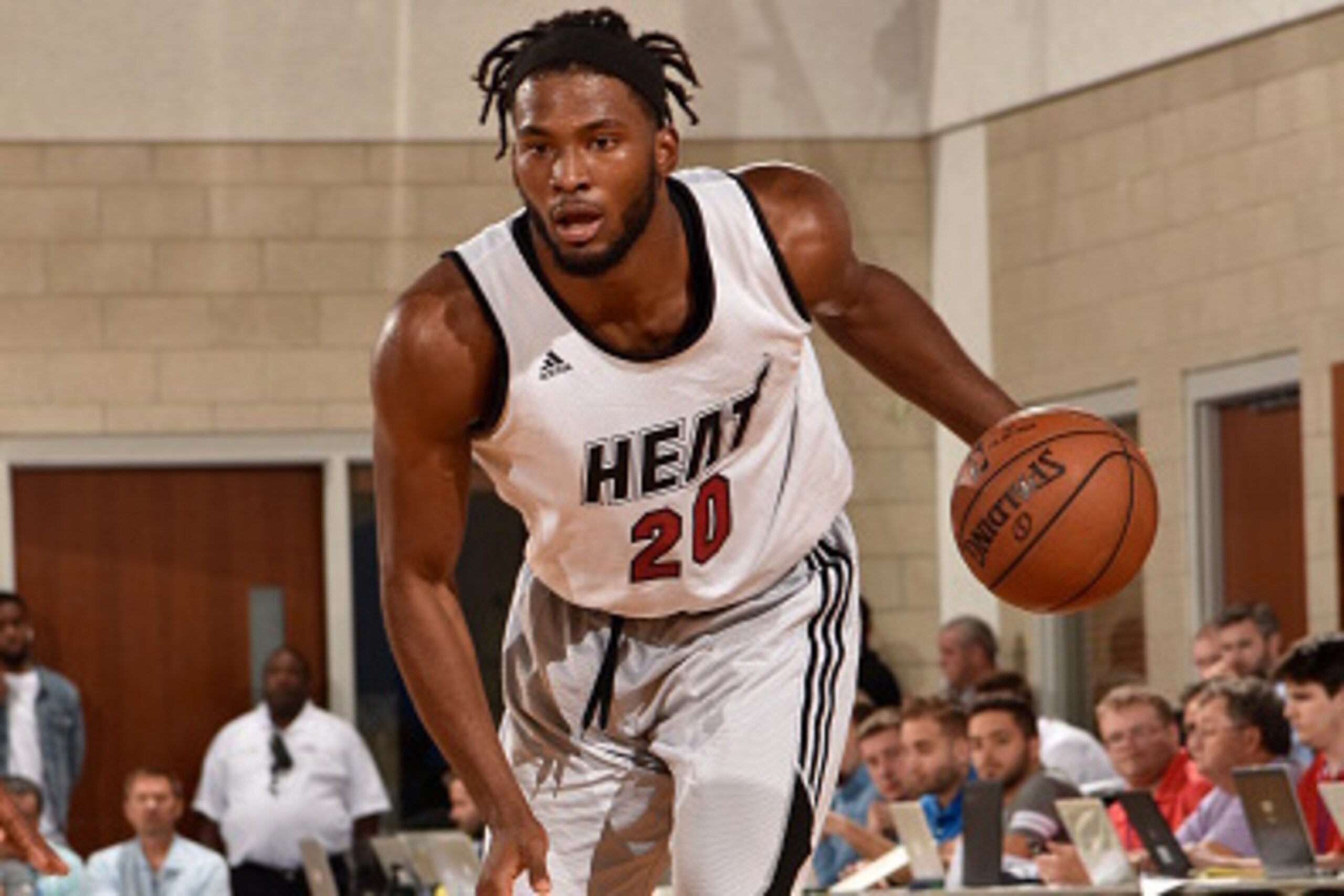 ORLANDO, FL - JULY 5:  Justise Winslow #20 of Miami Heat handles the ball against the Magic Blue during Summer League at the Amway Center on July 5, 2016 in Orlando, Florida. NOTE TO USER: User expressly acknowledges and agrees that, by downloading and or