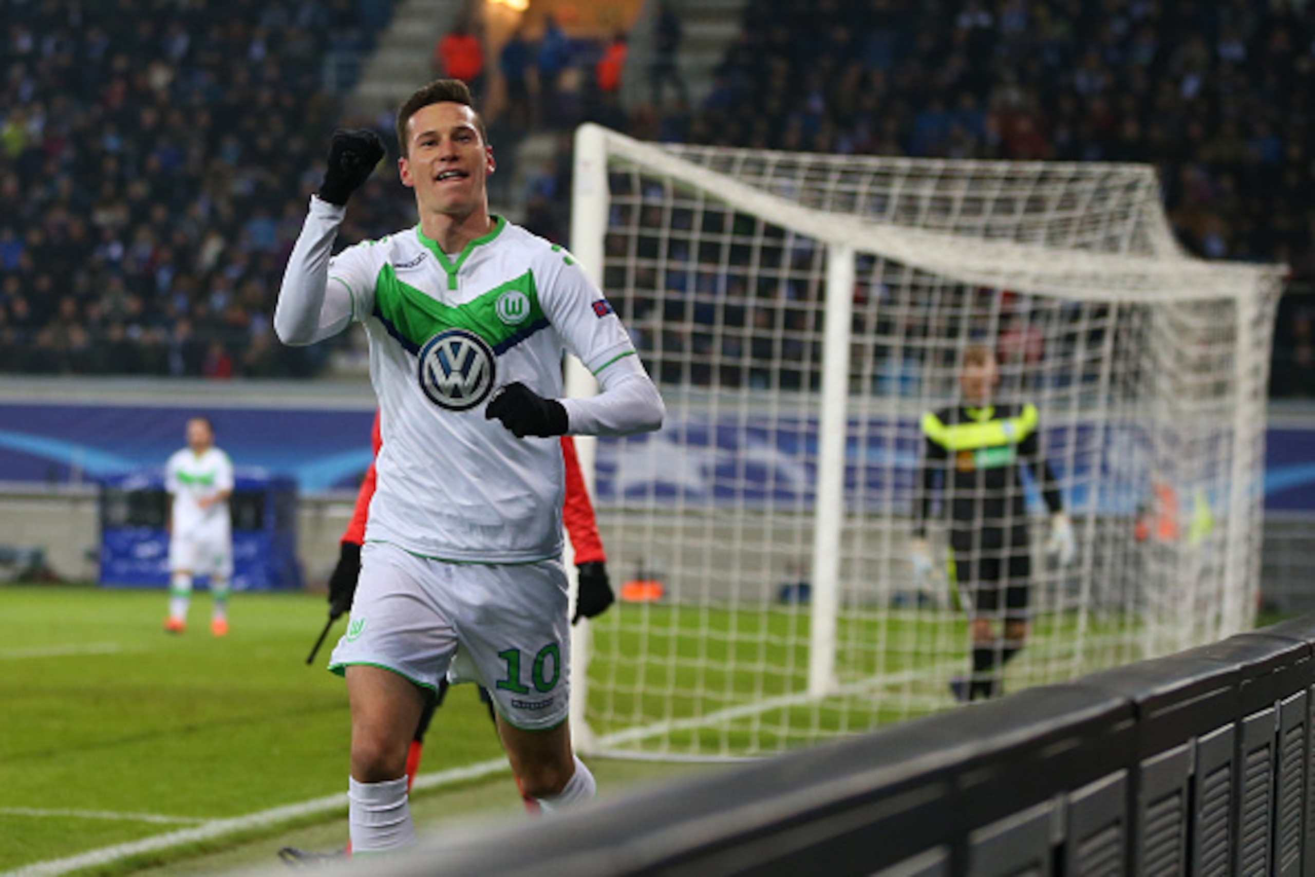 GENT, BELGIUM - FEBRUARY 17 : Julian Draxler of Wolfsburg celebrates after he scores a goal to make it 0-1 during the UEFA Champions League match between KAA Gent and VfL Wolfsburg at Ghelamco Arena, on February 17, 2016 in Gent, Belgium. (Photo by Cather